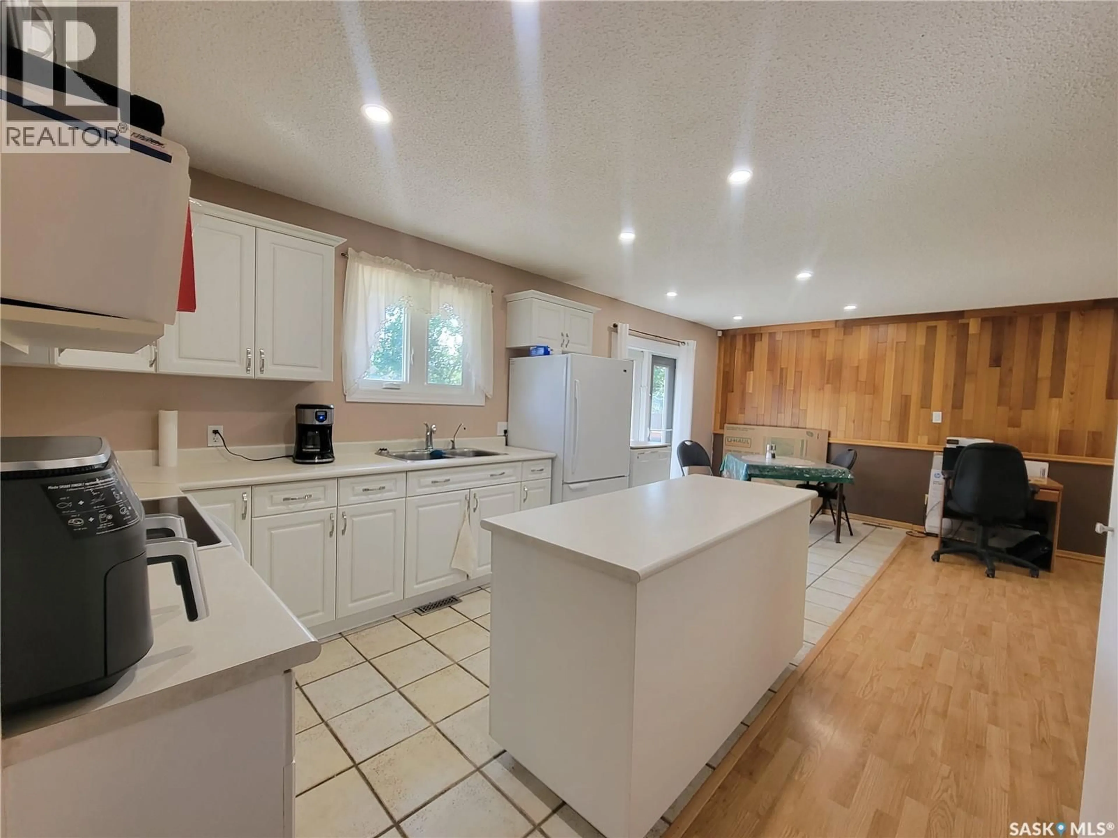 Open concept kitchen, unknown for 2212 95TH STREET, North Battleford Saskatchewan S9A3K5
