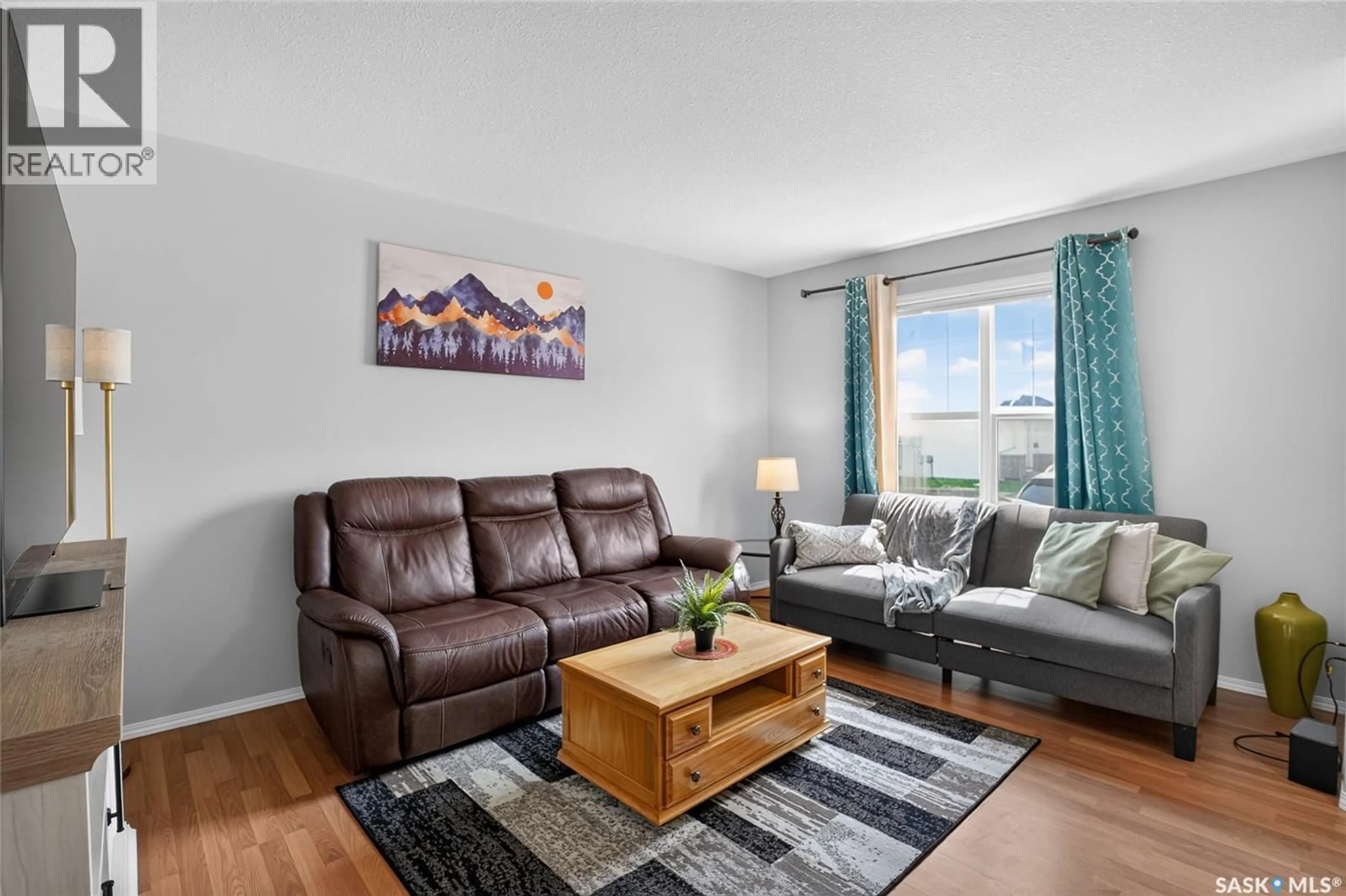 Living room with furniture, unknown for 102 - 13 PAWLYCHENKO LANE, Saskatoon Saskatchewan S7V1G9