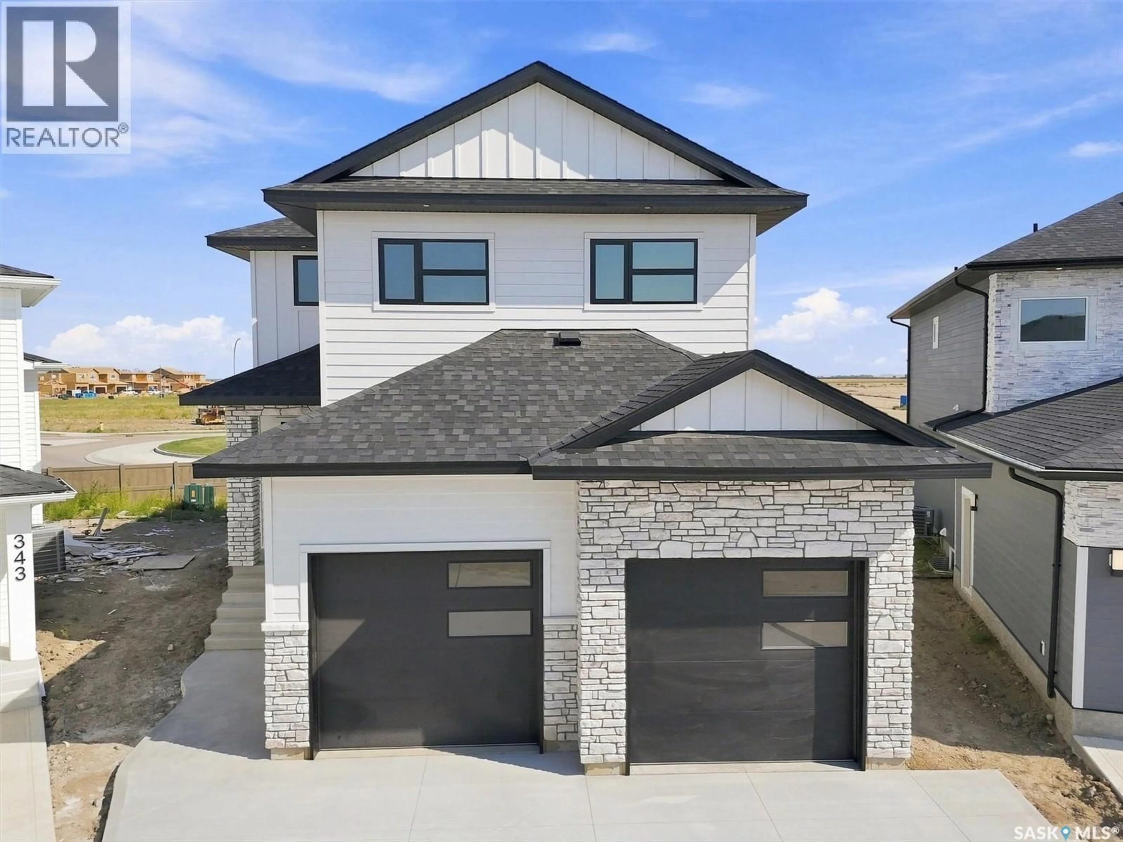Home with brick exterior material, street for 339 SHARMA CRESCENT, Saskatoon Saskatchewan S7W1K9