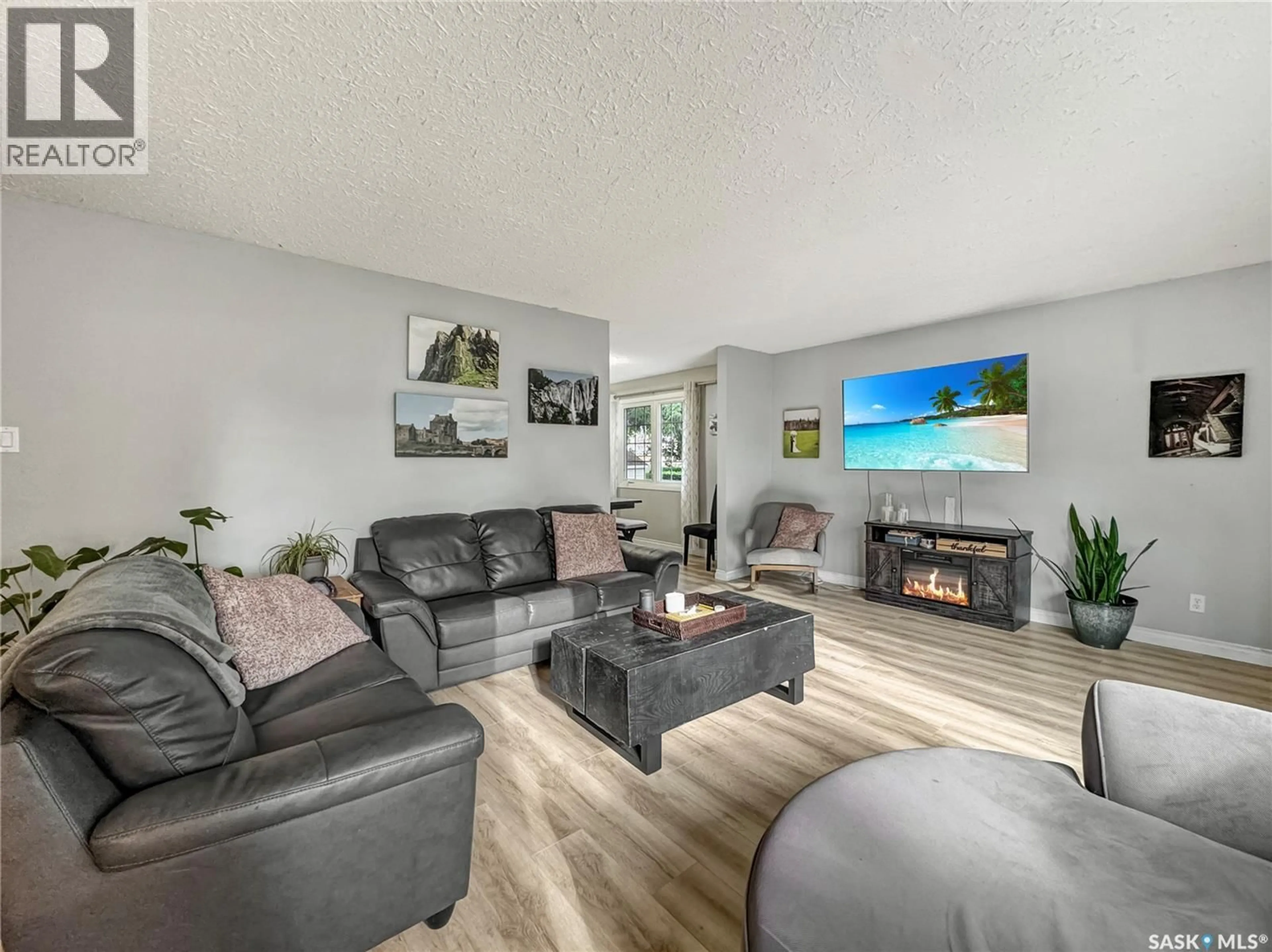 Living room with furniture, unknown for 2061 95TH STREET, North Battleford Saskatchewan S9A3C6