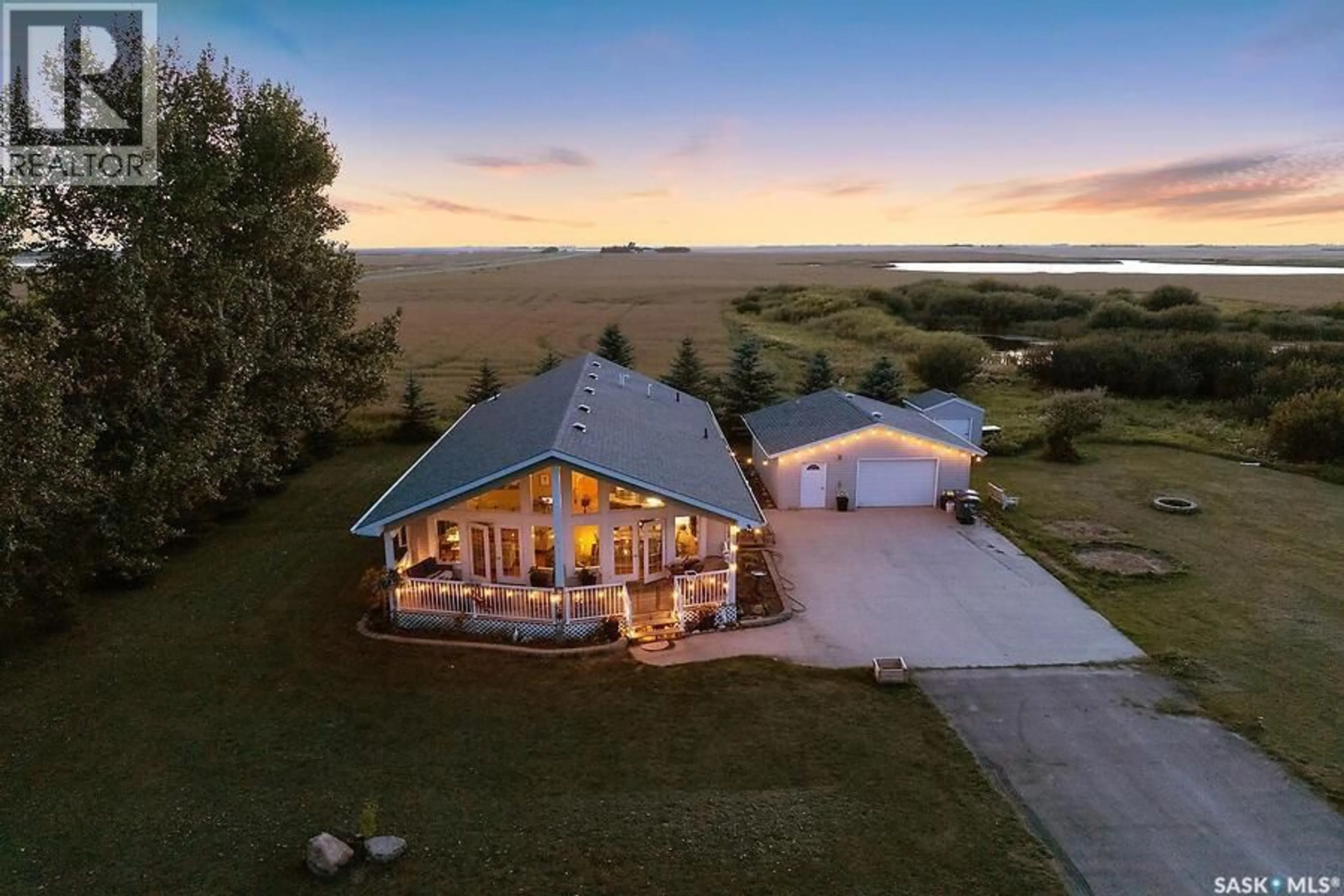 A pic from outside/outdoor area/front of a property/back of a property/a pic from drone, water/lake/river/ocean view for 134 SHARBER AVENUE, Glenavon Saskatchewan S0G1Y0