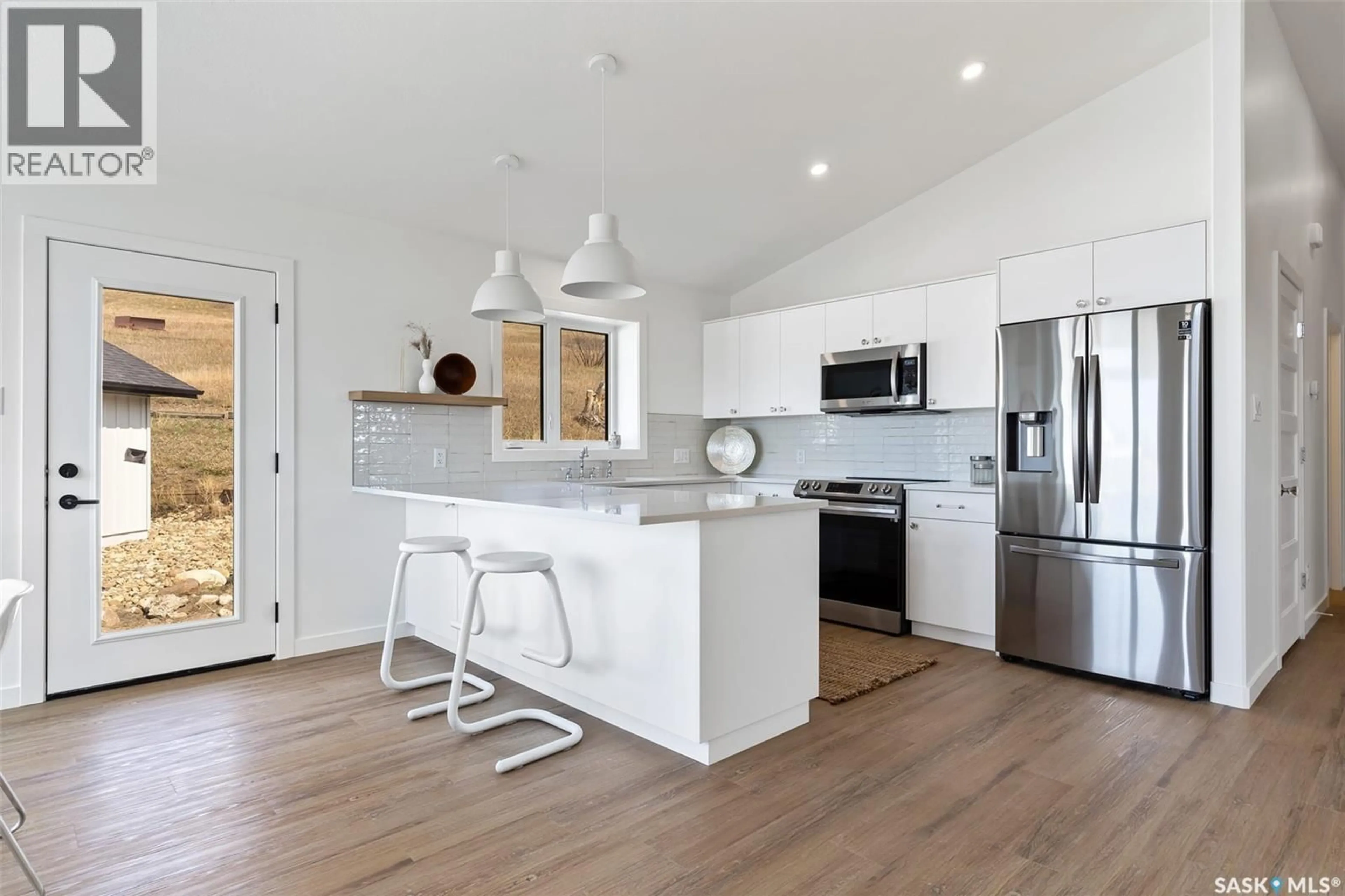 Open concept kitchen, unknown for 7 70 8TH AVENUE, Lumsden Saskatchewan S0G3C0