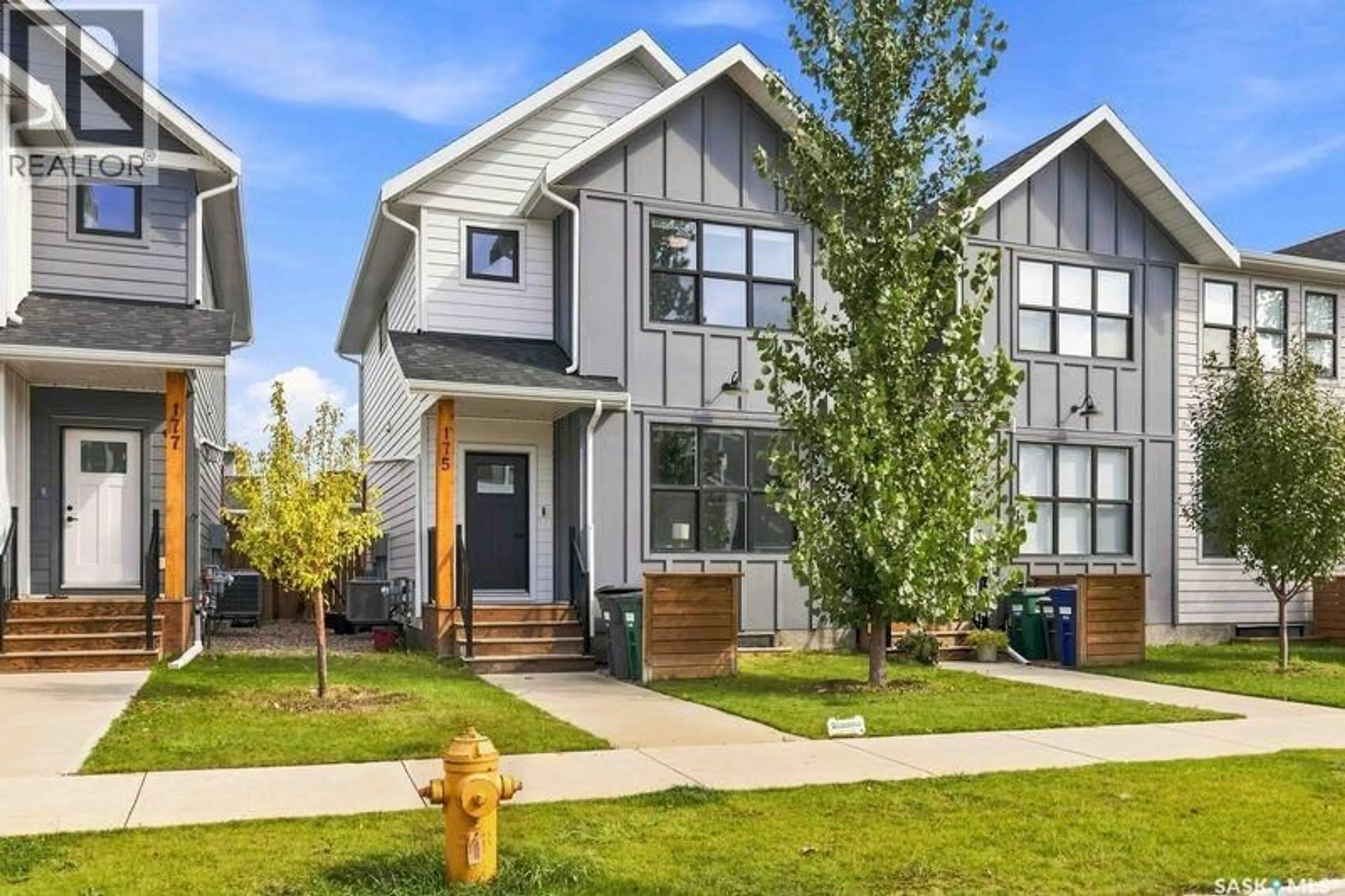 Home with vinyl exterior material, street for 175 ROSEWOOD BOULEVARD, Saskatoon Saskatchewan S7V0Z1