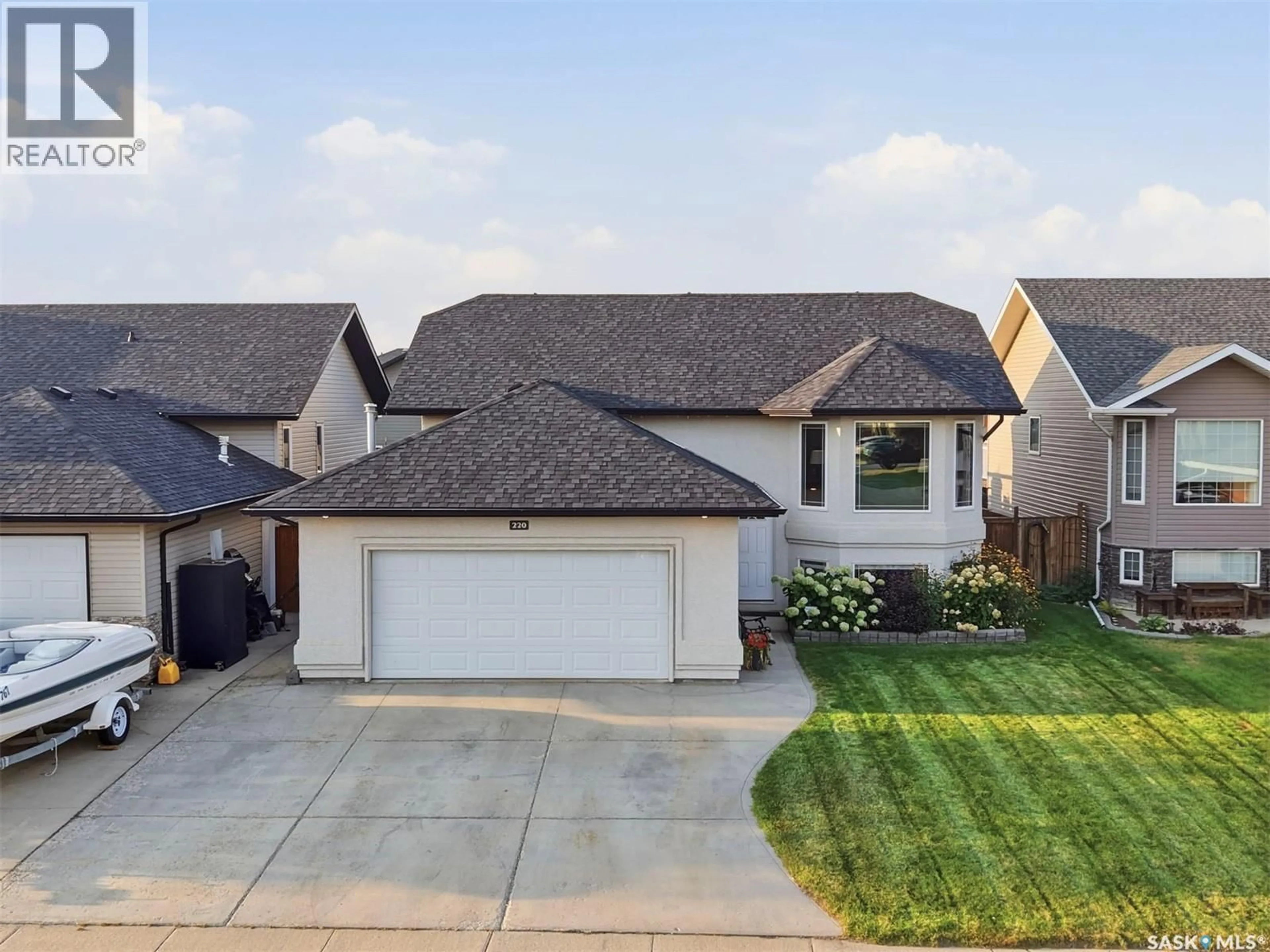 A pic from outside/outdoor area/front of a property/back of a property/a pic from drone, street for 220 FLOYD COURT, Warman Saskatchewan S0K4S1