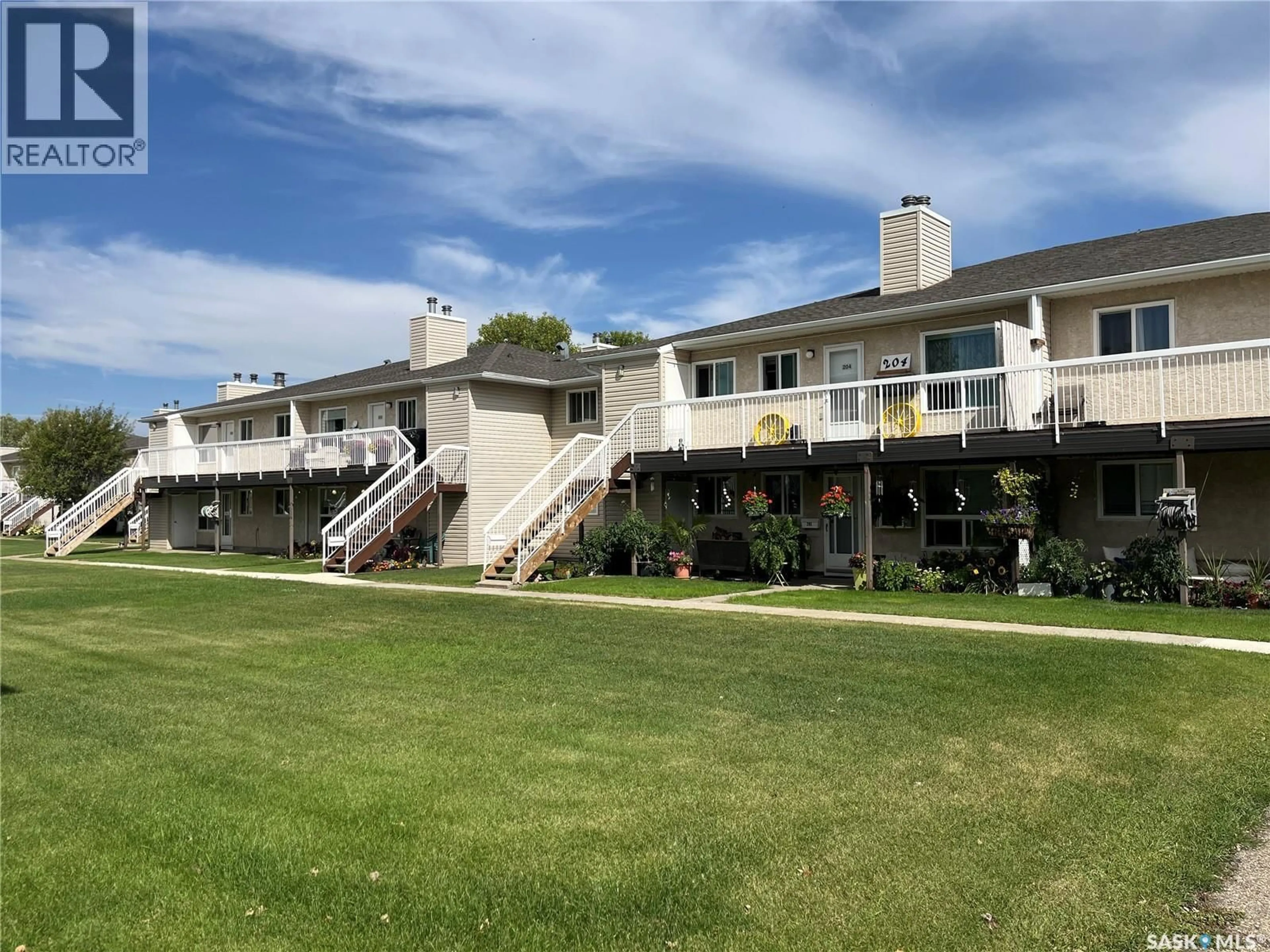 A pic from outside/outdoor area/front of a property/back of a property/a pic from drone, water/lake/river/ocean view for 67 - 106 WOOD LILY DRIVE, Moose Jaw Saskatchewan S6J1G6