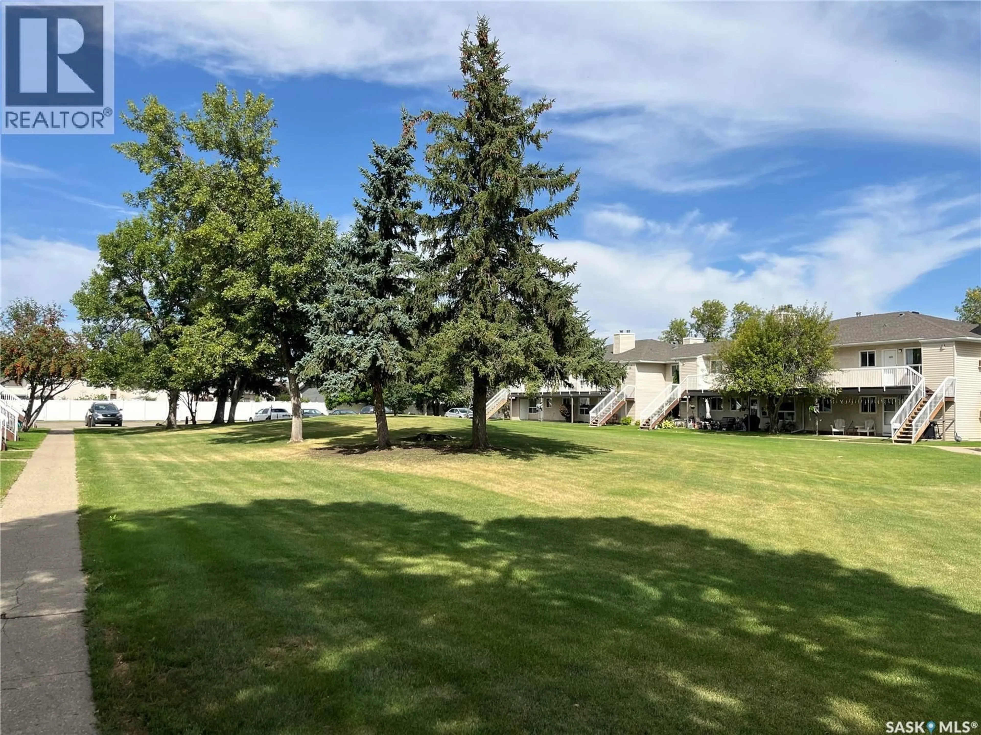 A pic from outside/outdoor area/front of a property/back of a property/a pic from drone, mountain view for 67 - 106 WOOD LILY DRIVE, Moose Jaw Saskatchewan S6J1G6