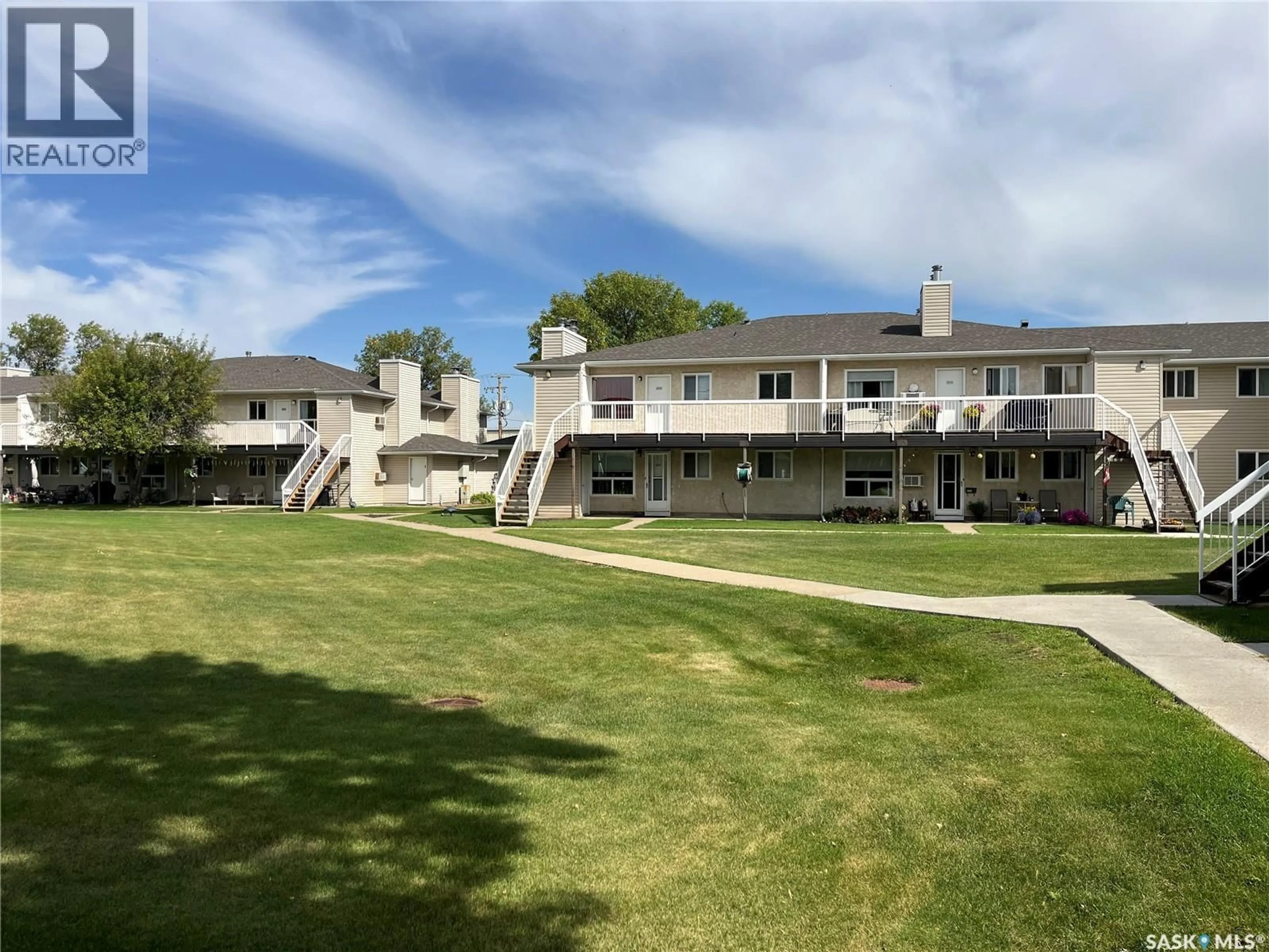 A pic from outside/outdoor area/front of a property/back of a property/a pic from drone, unknown for 67 - 106 WOOD LILY DRIVE, Moose Jaw Saskatchewan S6J1G6