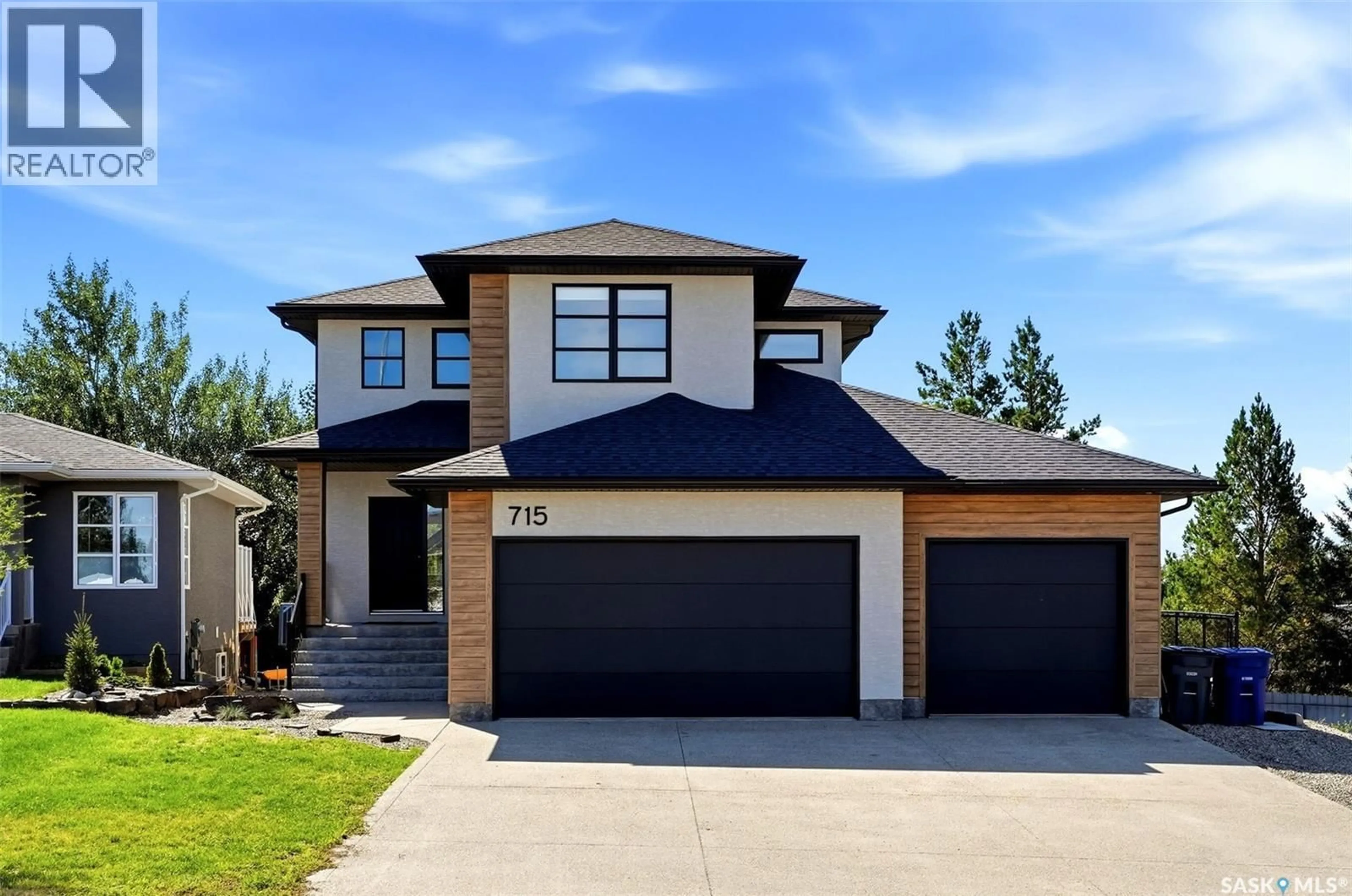 Home with brick exterior material, street for 715 3RD AVENUE, Pilot Butte Saskatchewan S0G3Z0