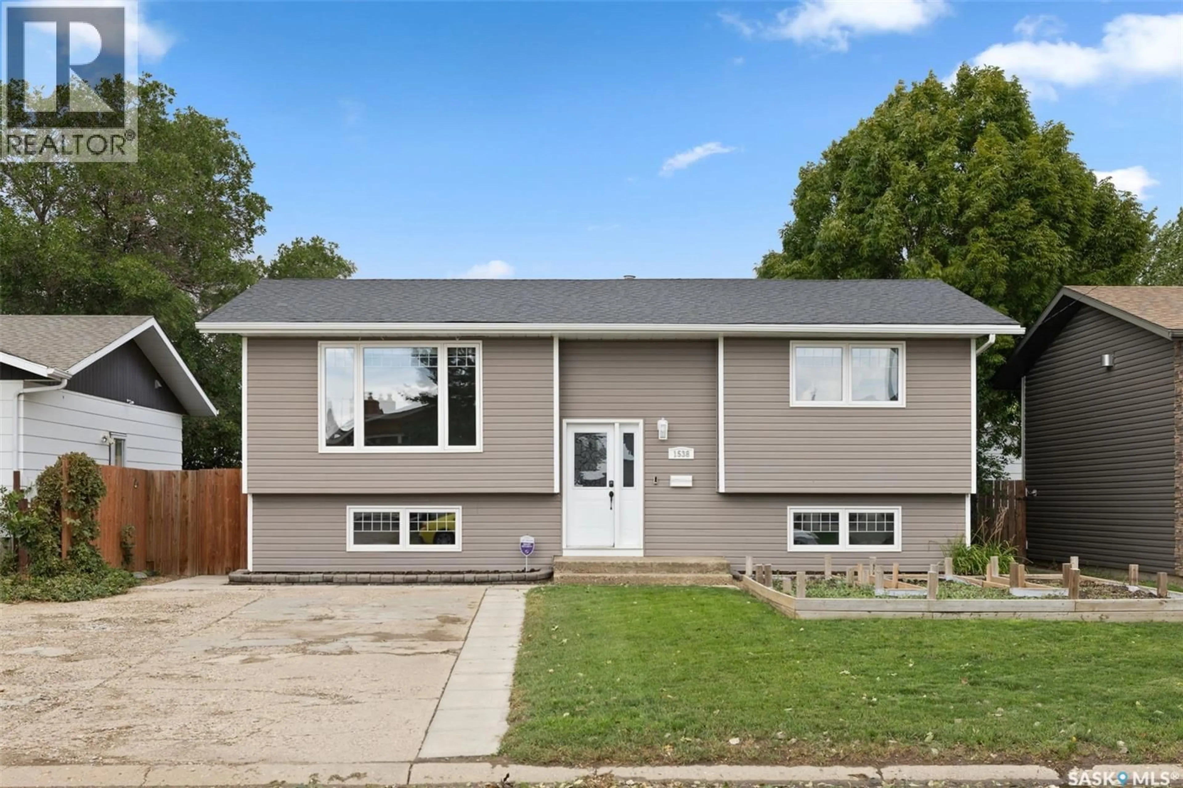 Home with vinyl exterior material, street for 1538 SPADINA STREET, Moose Jaw Saskatchewan S6H7E6