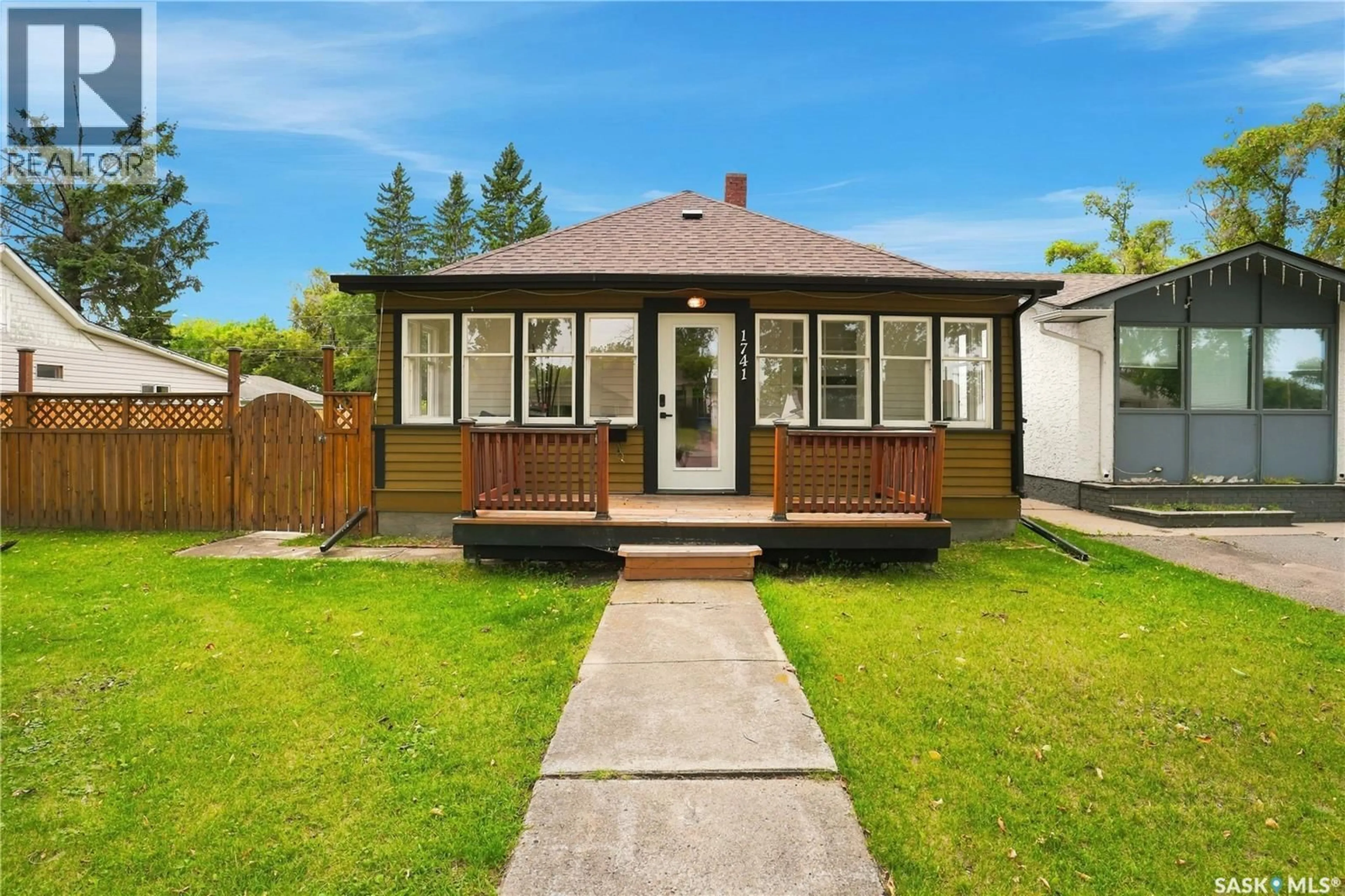 Home with vinyl exterior material, street for 1741 98TH STREET, North Battleford Saskatchewan S9A0M9