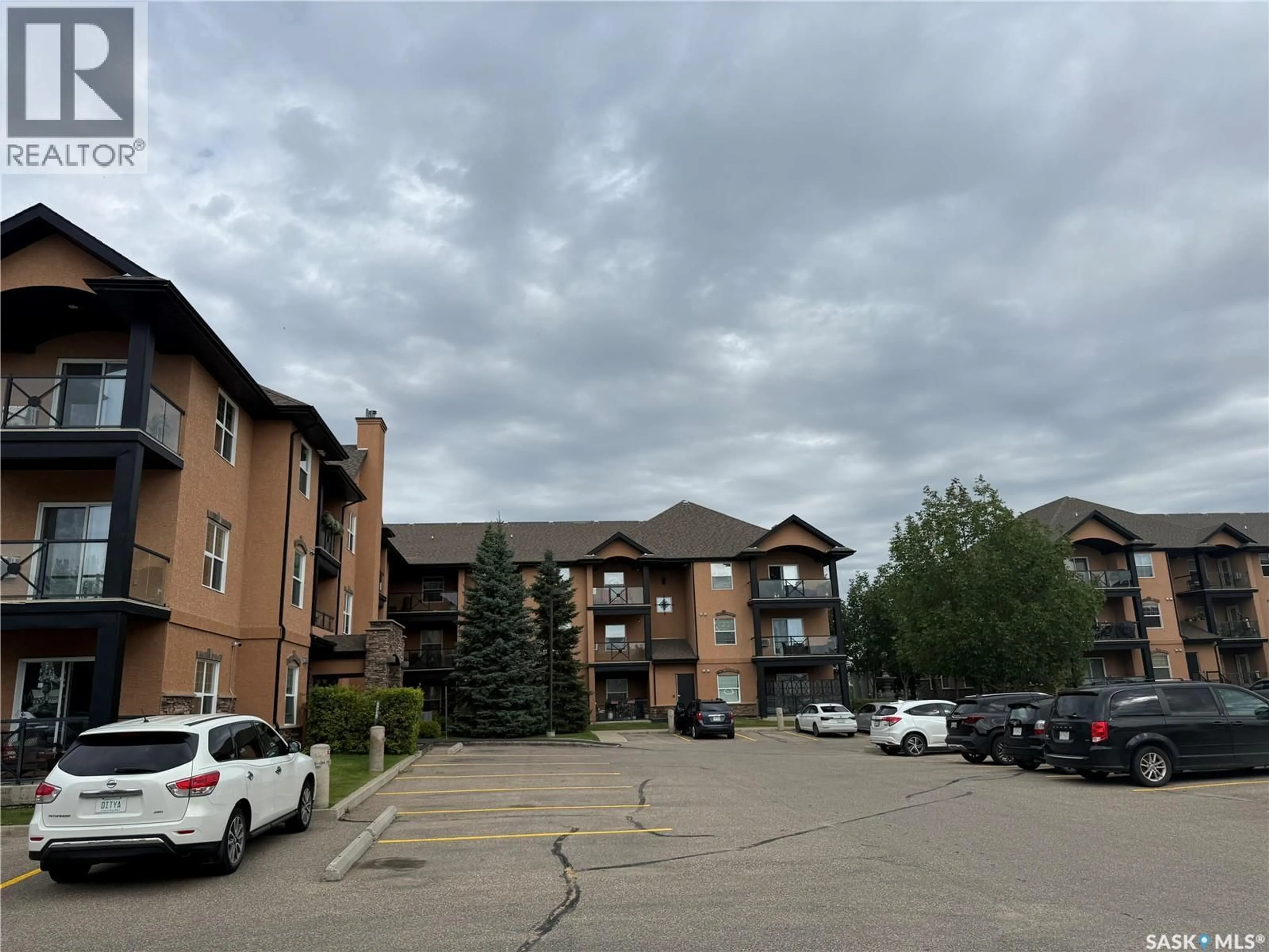 A pic from outside/outdoor area/front of a property/back of a property/a pic from drone, unknown for 211A 103 WELLMAN CRESCENT, Saskatoon Saskatchewan S7T0C1