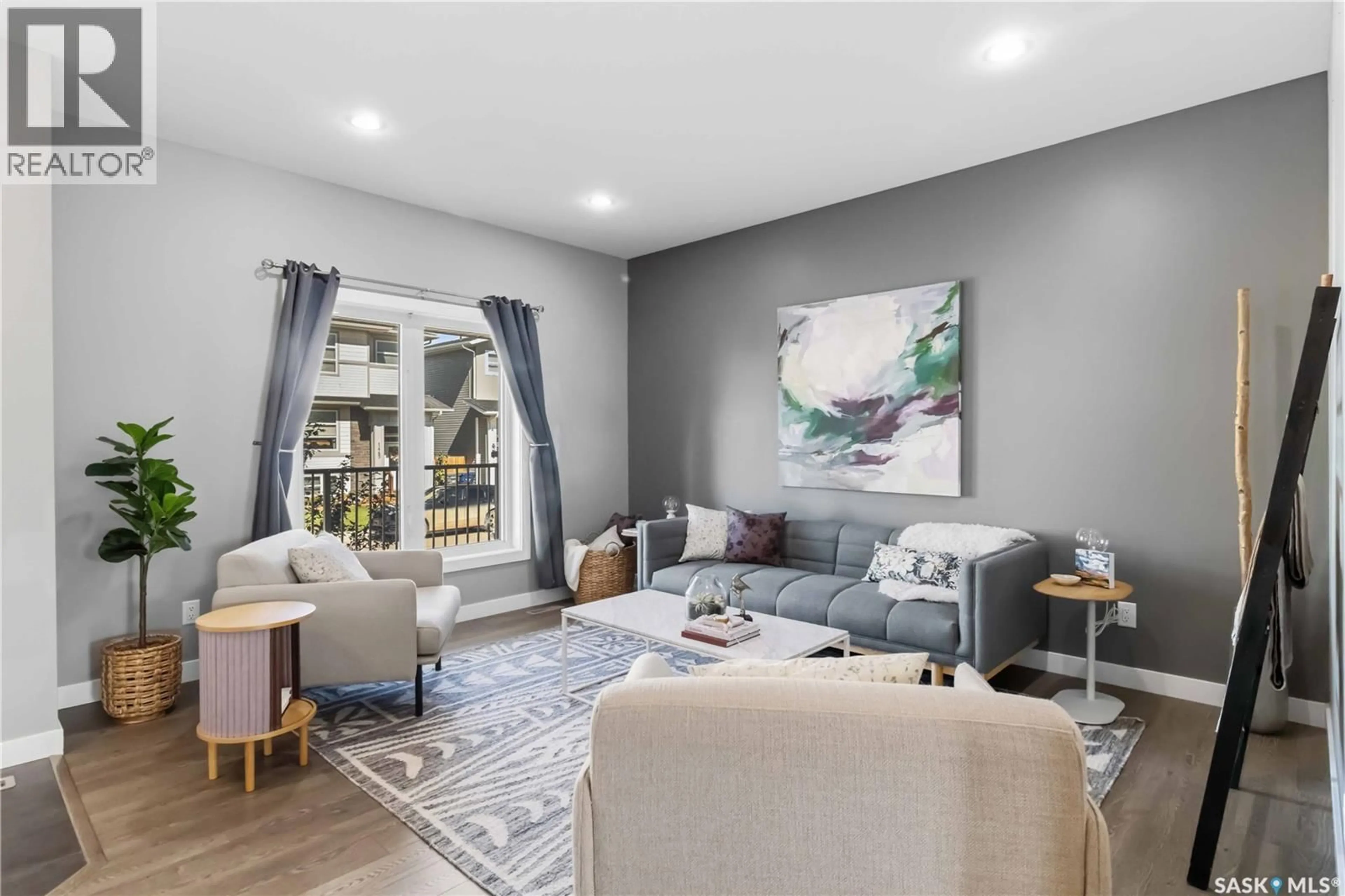 Living room with furniture, unknown for 1440 CASSAT DRIVE, Martensville Saskatchewan S0K2T1