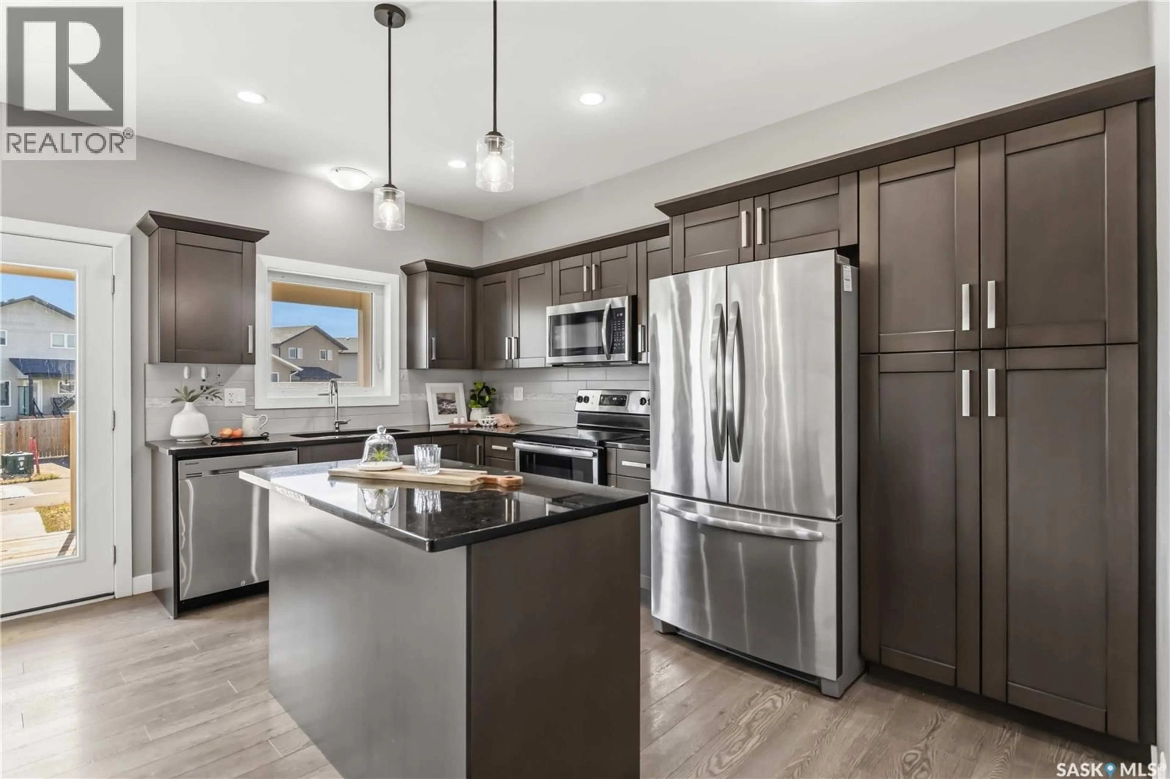 Open concept kitchen, unknown for 1440 CASSAT DRIVE, Martensville Saskatchewan S0K2T1