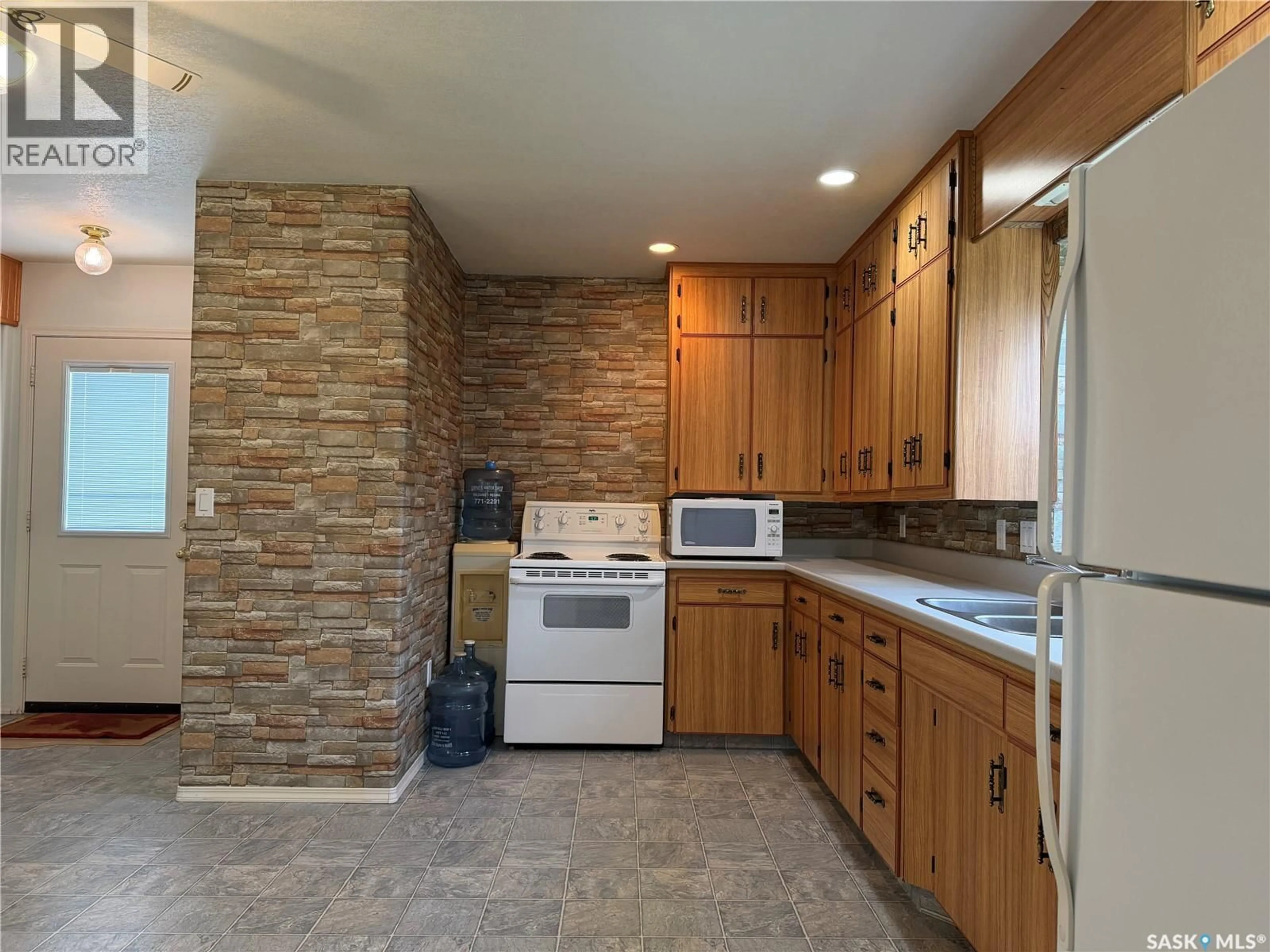 Standard kitchen, ceramic/tile floor for 2 RAILWAY AVENUE, Dafoe Saskatchewan S0K1C0