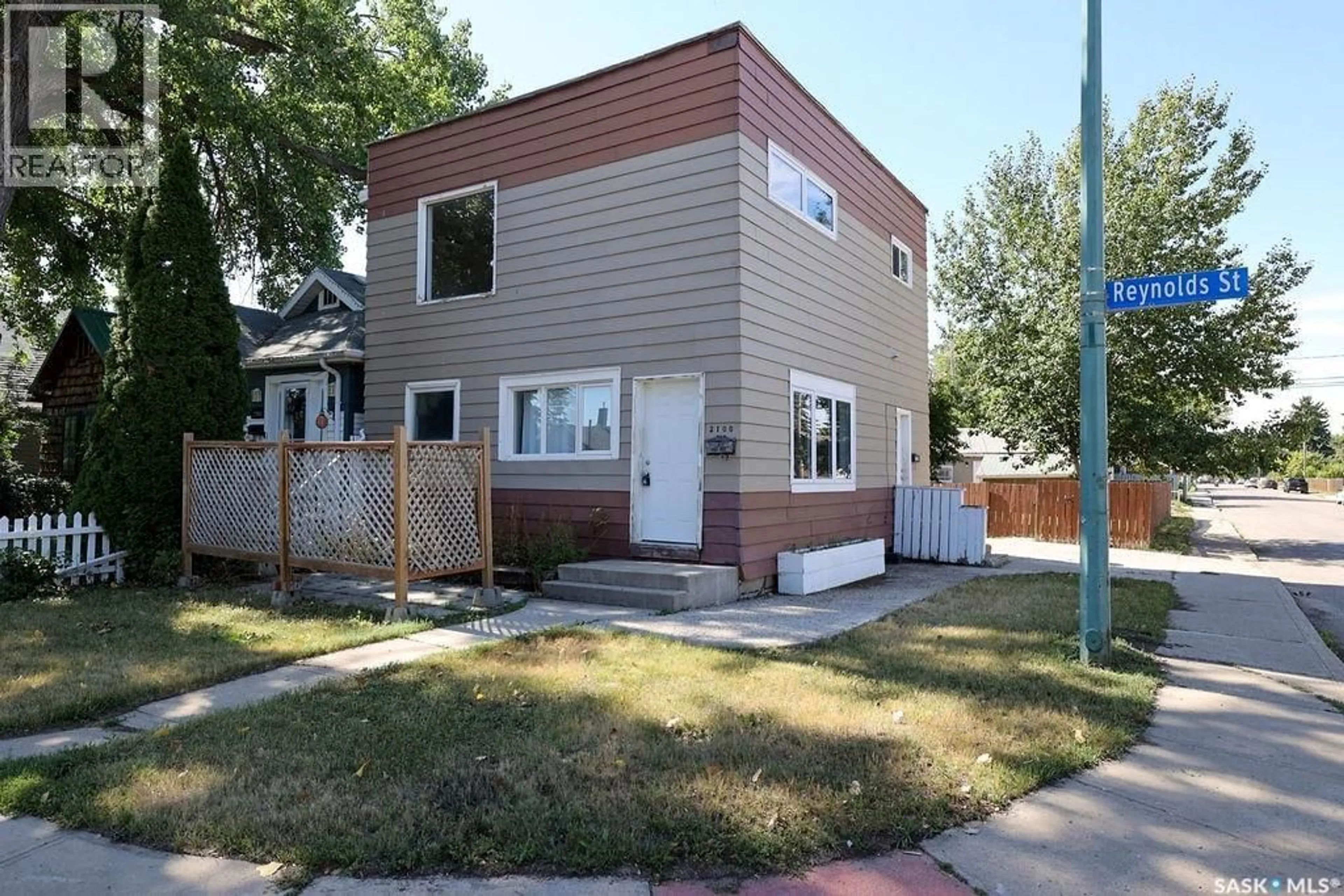 Home with vinyl exterior material, street for 2100 REYNOLDS STREET, Regina Saskatchewan S4N3N1