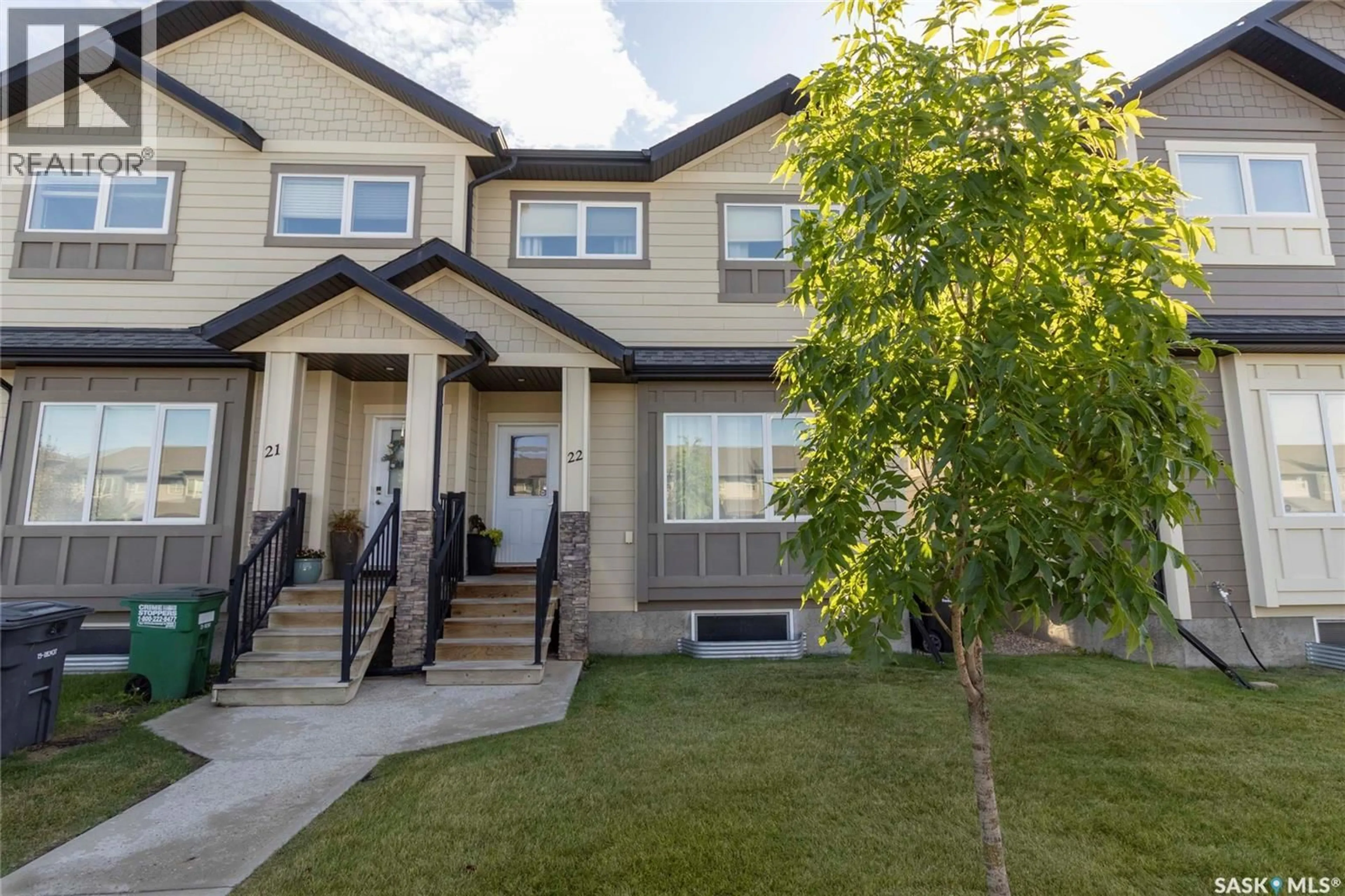 Home with vinyl exterior material, street for N - 22 111 ROSEWOOD GATE, Saskatoon Saskatchewan S7V0E5