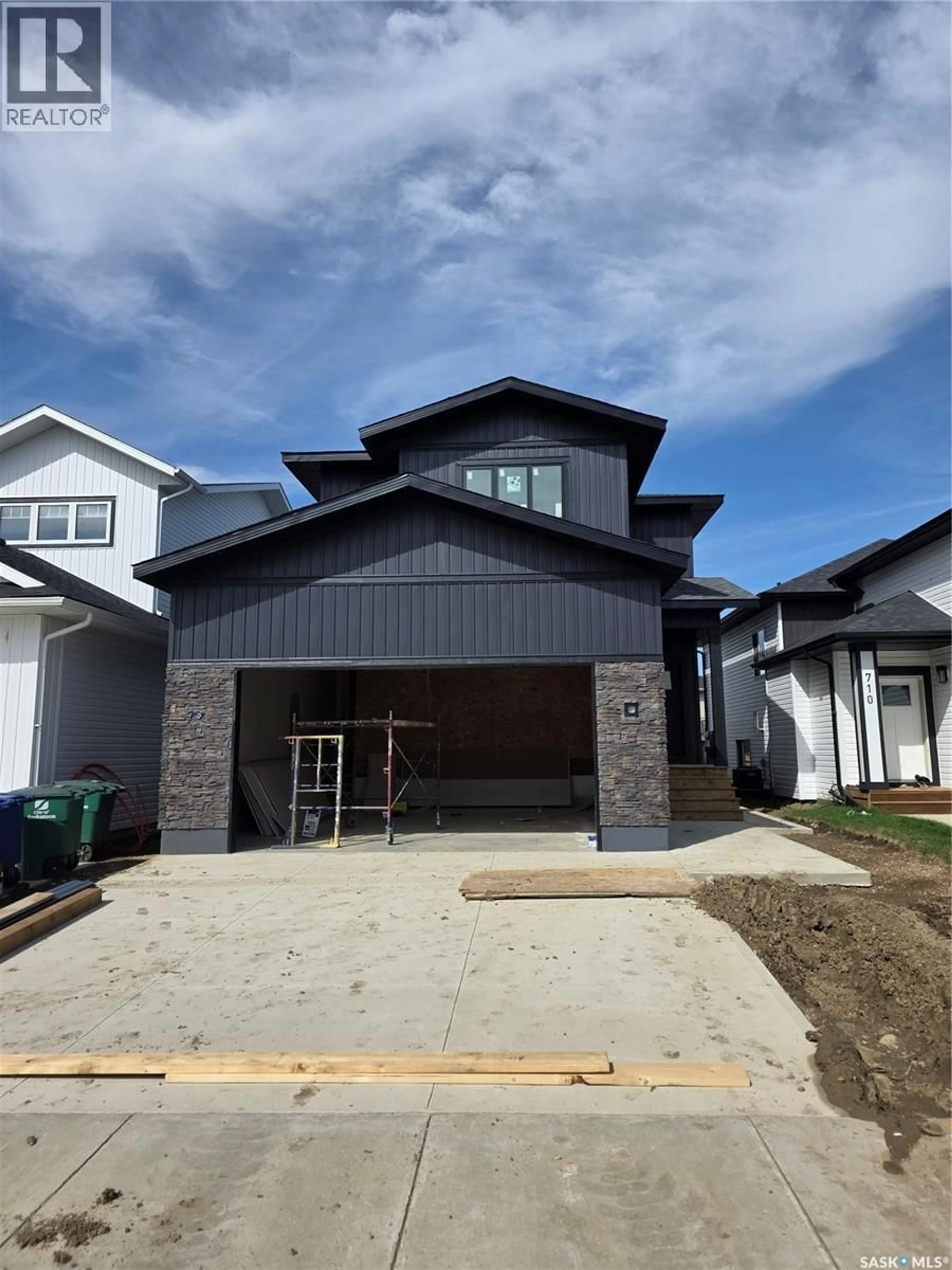 Home with brick exterior material, street for 706 NAZARALI UNION, Saskatoon Saskatchewan S7V1X4