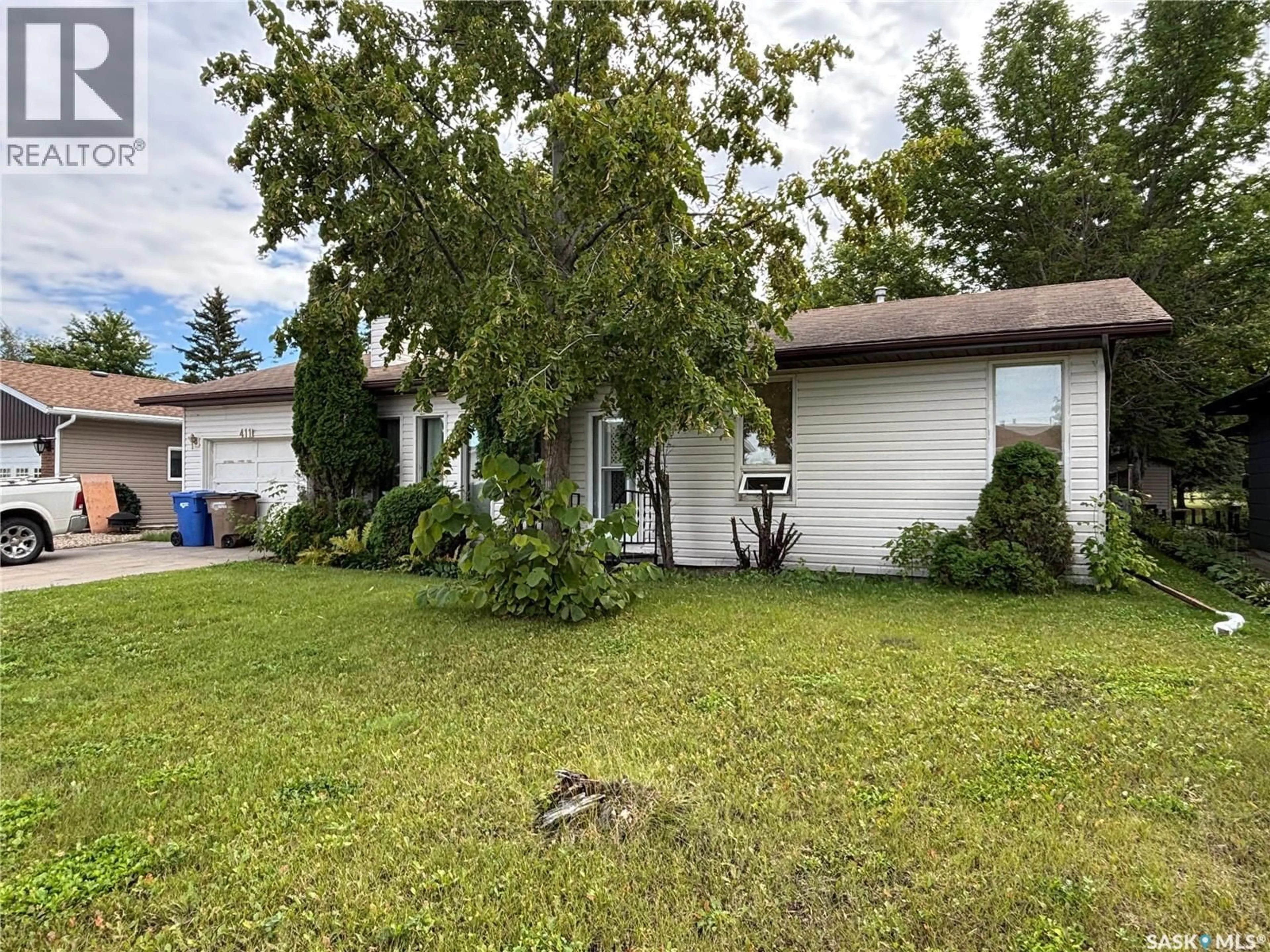 A pic from outside/outdoor area/front of a property/back of a property/a pic from drone, street for 411 CASKEY DRIVE, Melfort Saskatchewan S0E1A0