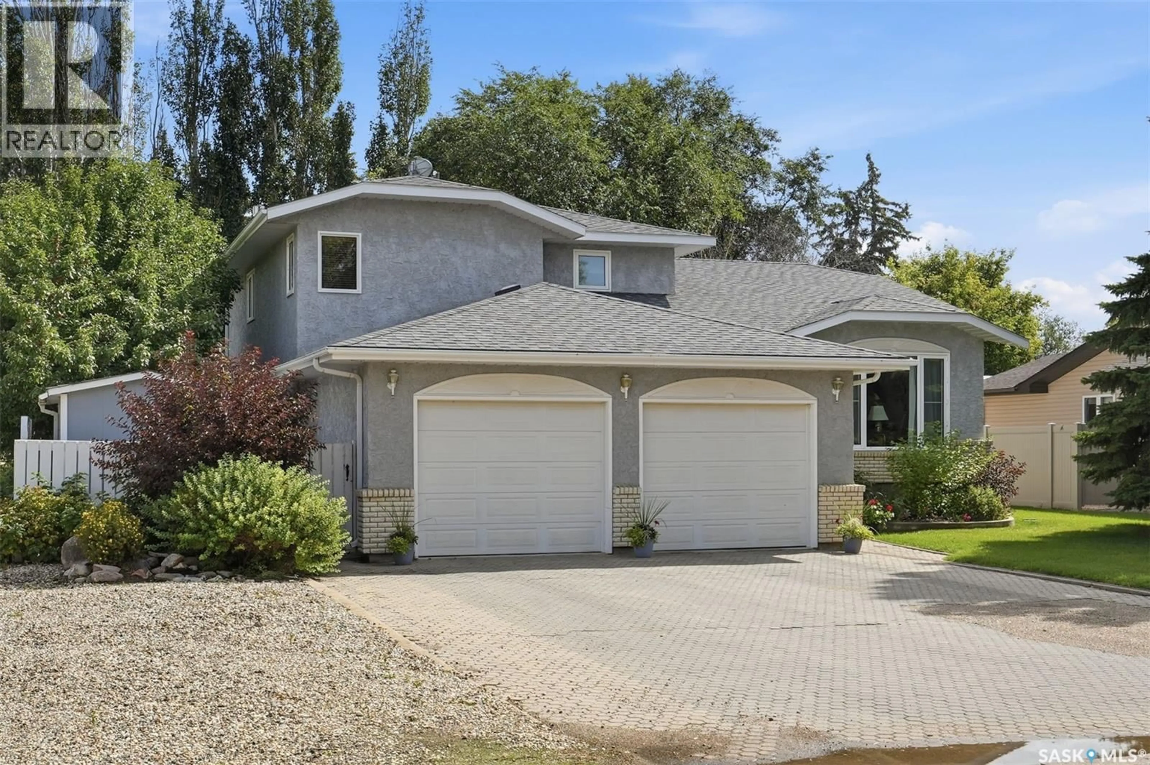 Home with vinyl exterior material, street for 504 3RD STREET, Watrous Saskatchewan S0K4T0