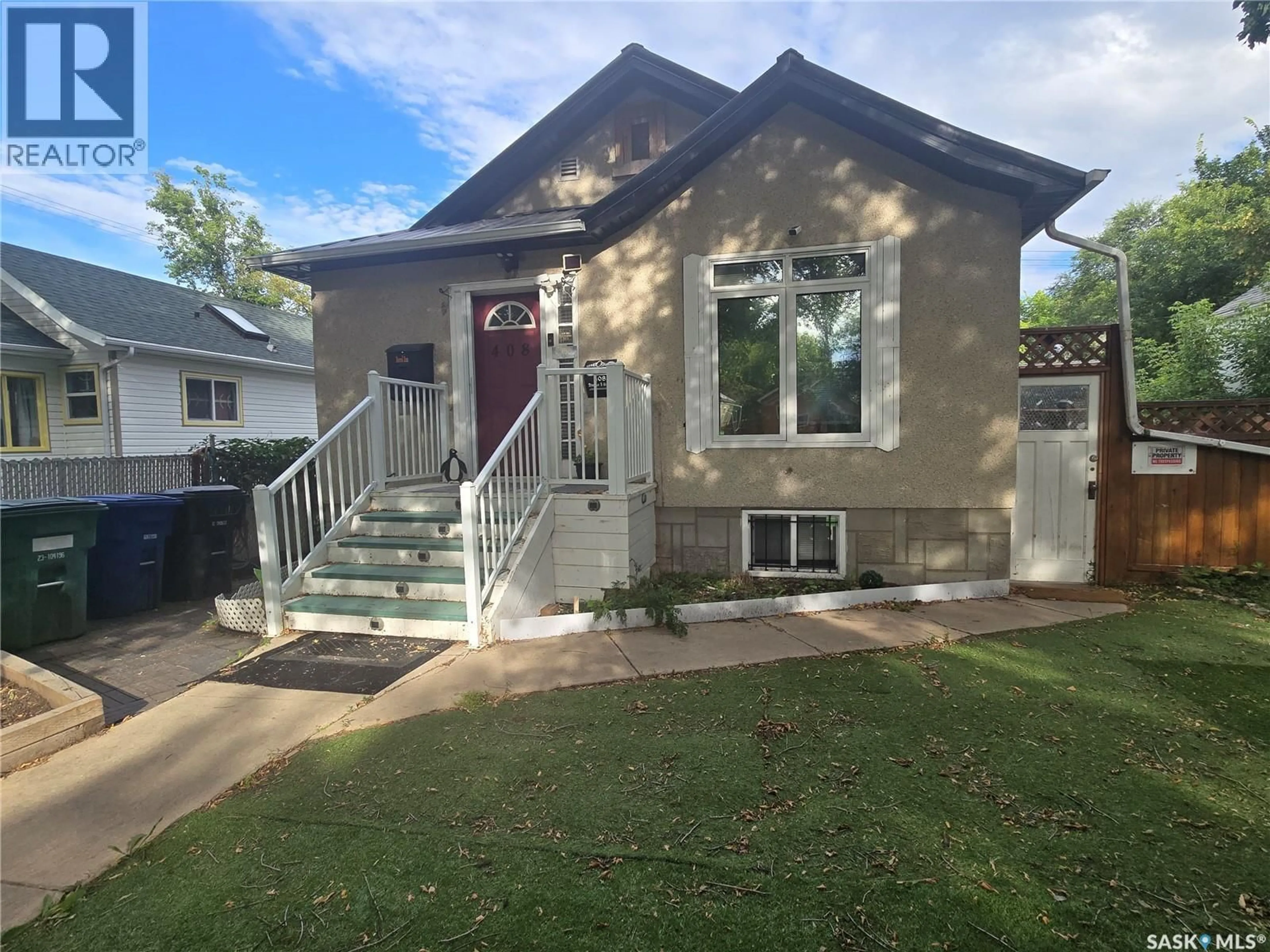 Home with vinyl exterior material, street for 408 I AVENUE, Saskatoon Saskatchewan S7M1P4