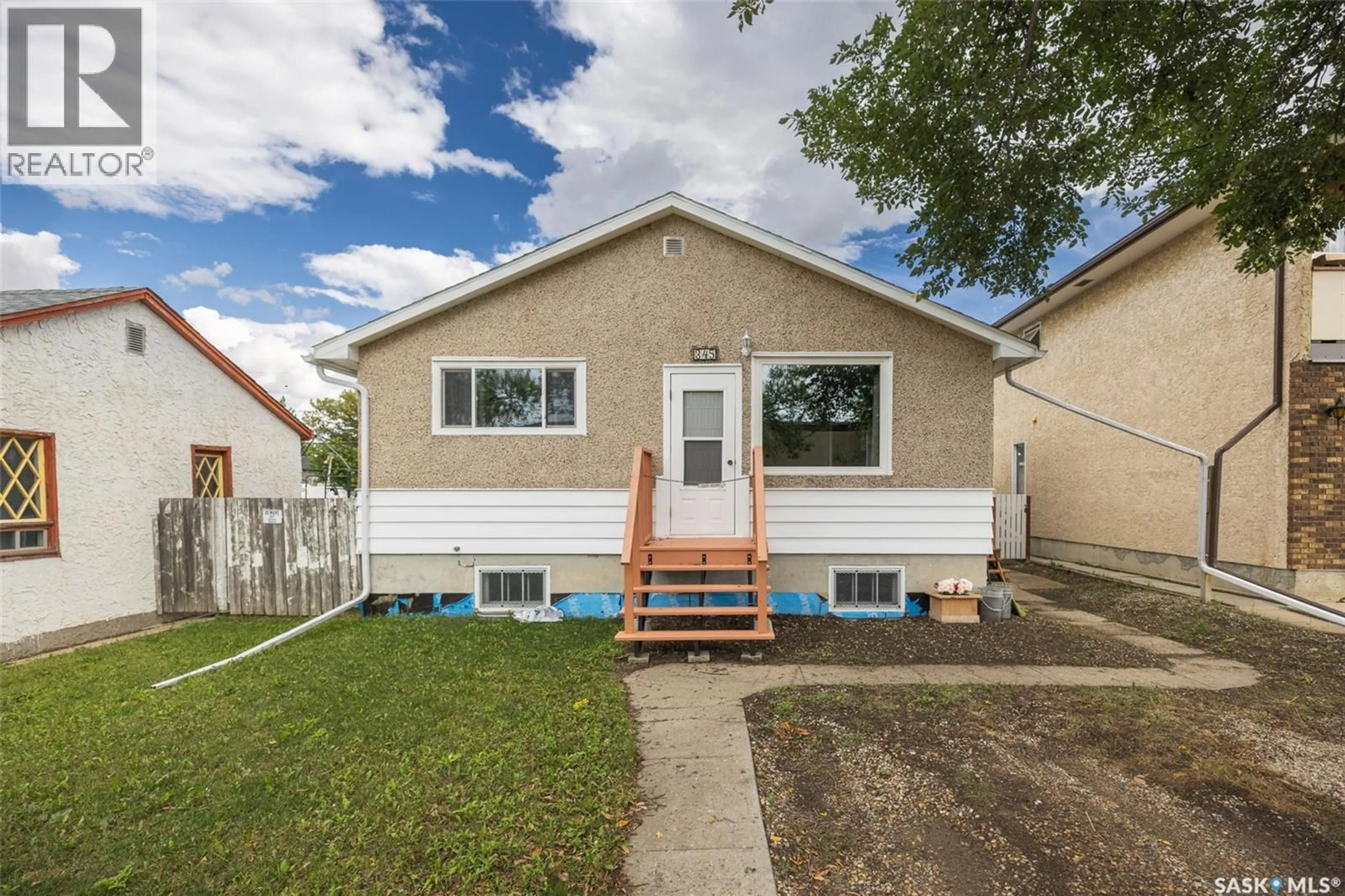Home with vinyl exterior material, street for 345 MCINTYRE STREET, Regina Saskatchewan S4R2L9