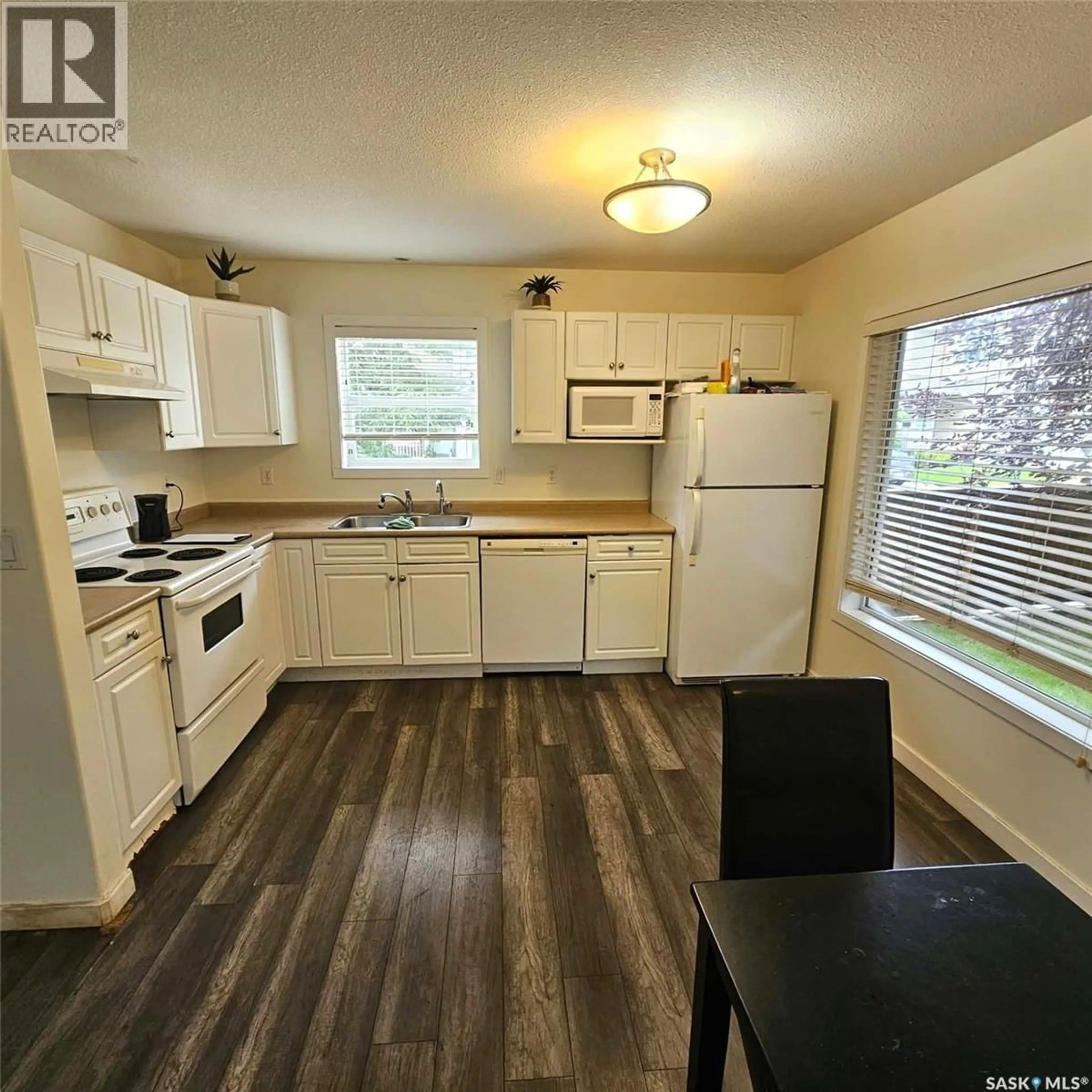 Standard kitchen, wood/laminate floor for 46 - 4901 CHILD AVENUE, Regina Saskatchewan S4X4P1