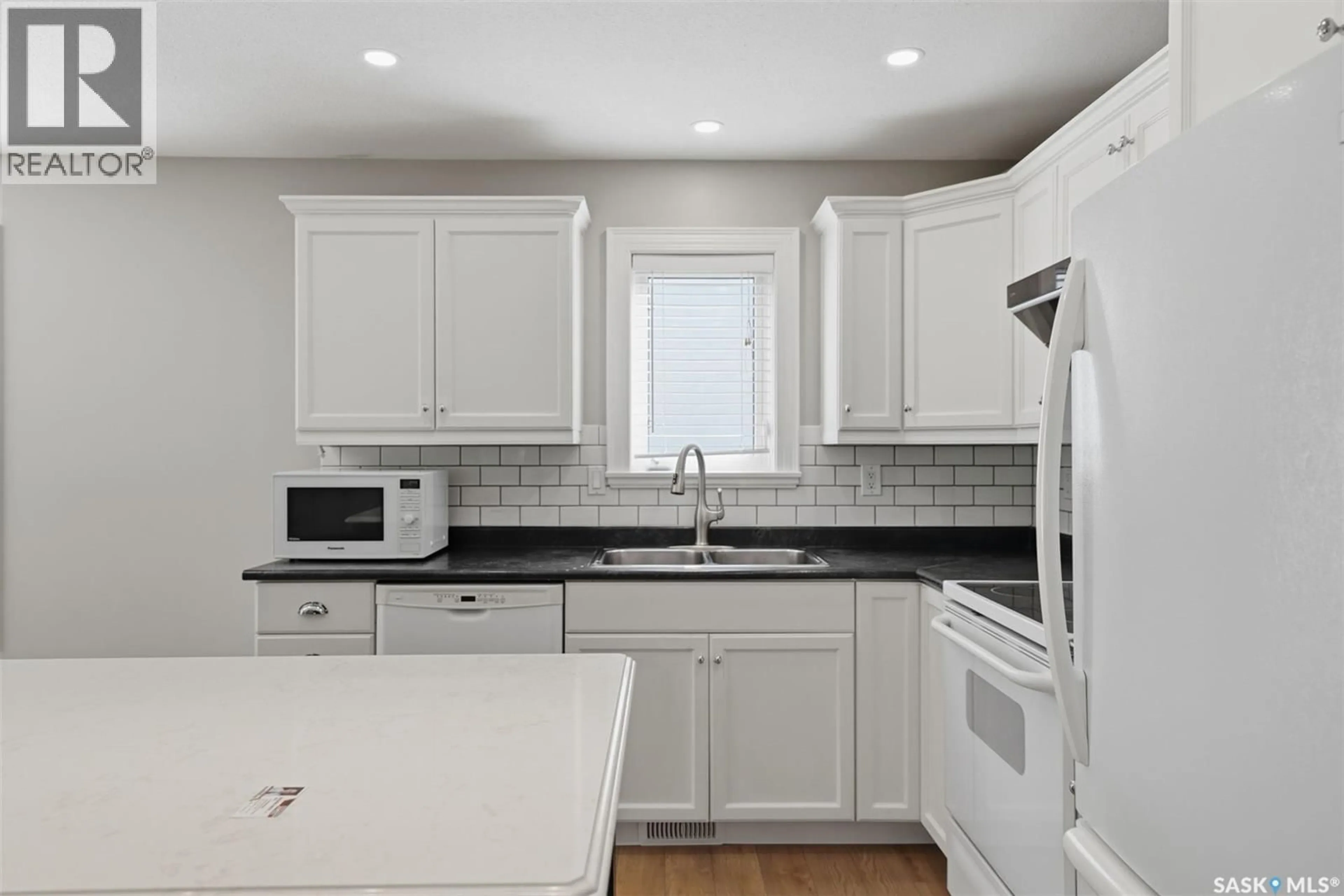 Standard kitchen, ceramic/tile floor for 338 STENSRUD ROAD, Saskatoon Saskatchewan S7W1B4