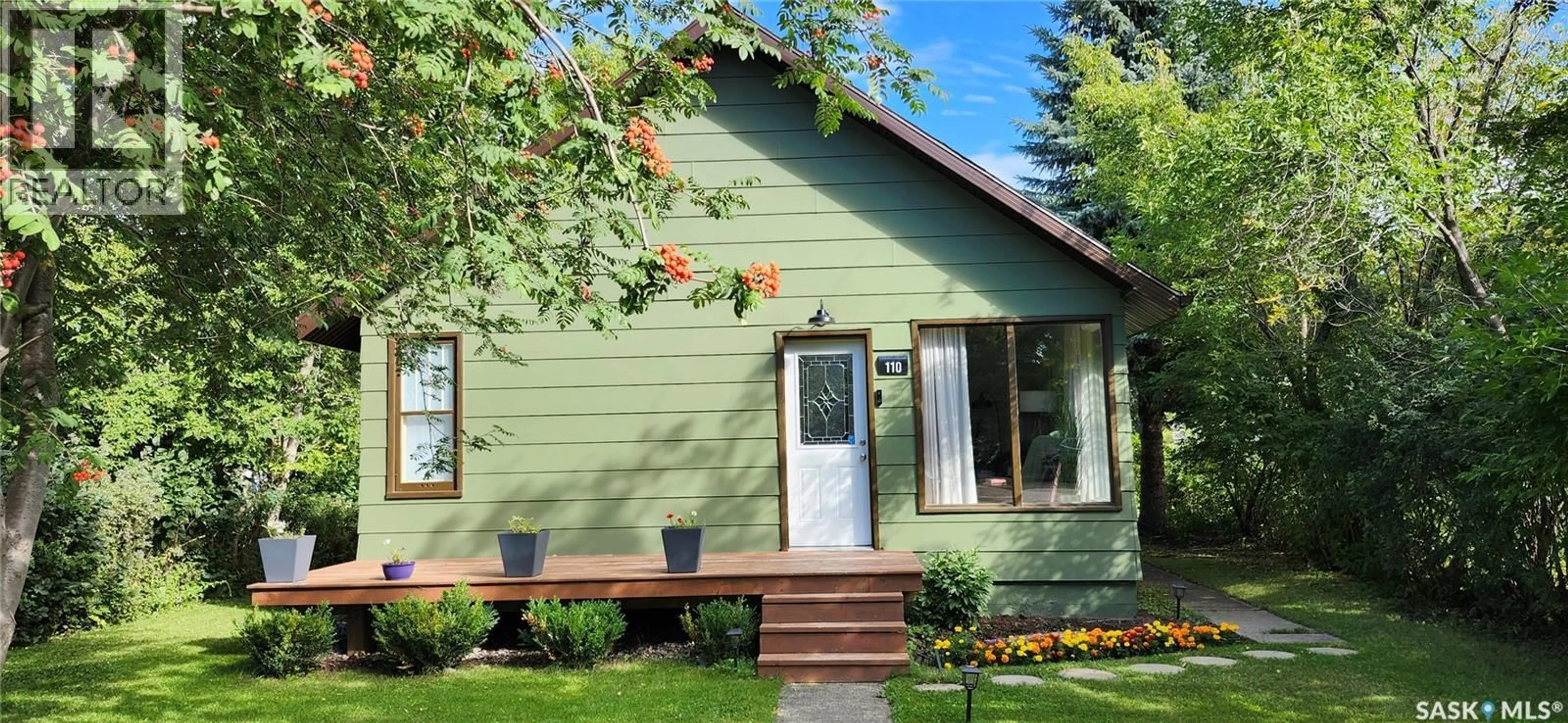 Home with vinyl exterior material, street for 110 3RD STREET, Wakaw Saskatchewan S0K4P0