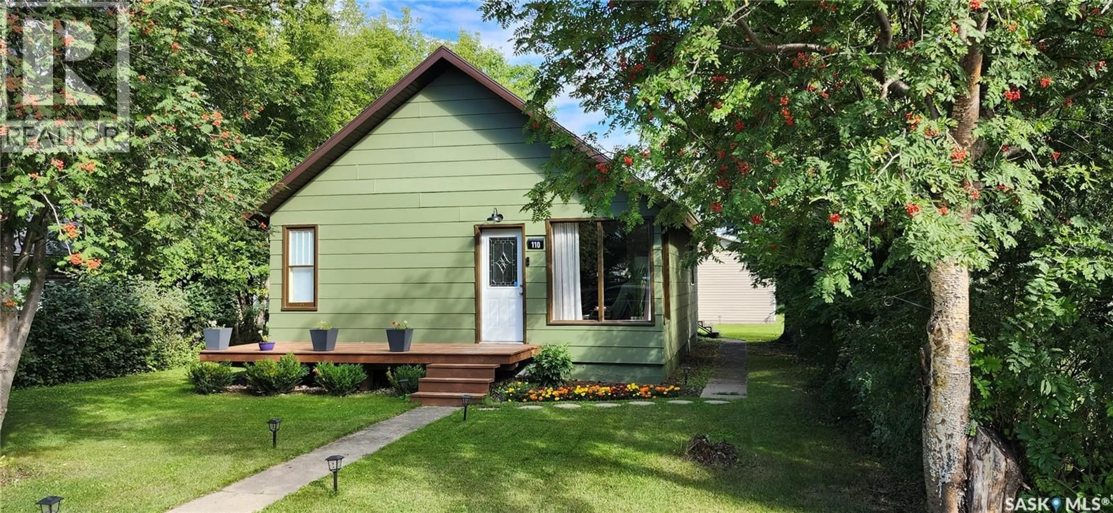 Home with vinyl exterior material, street for 110 3RD STREET, Wakaw Saskatchewan S0K4P0
