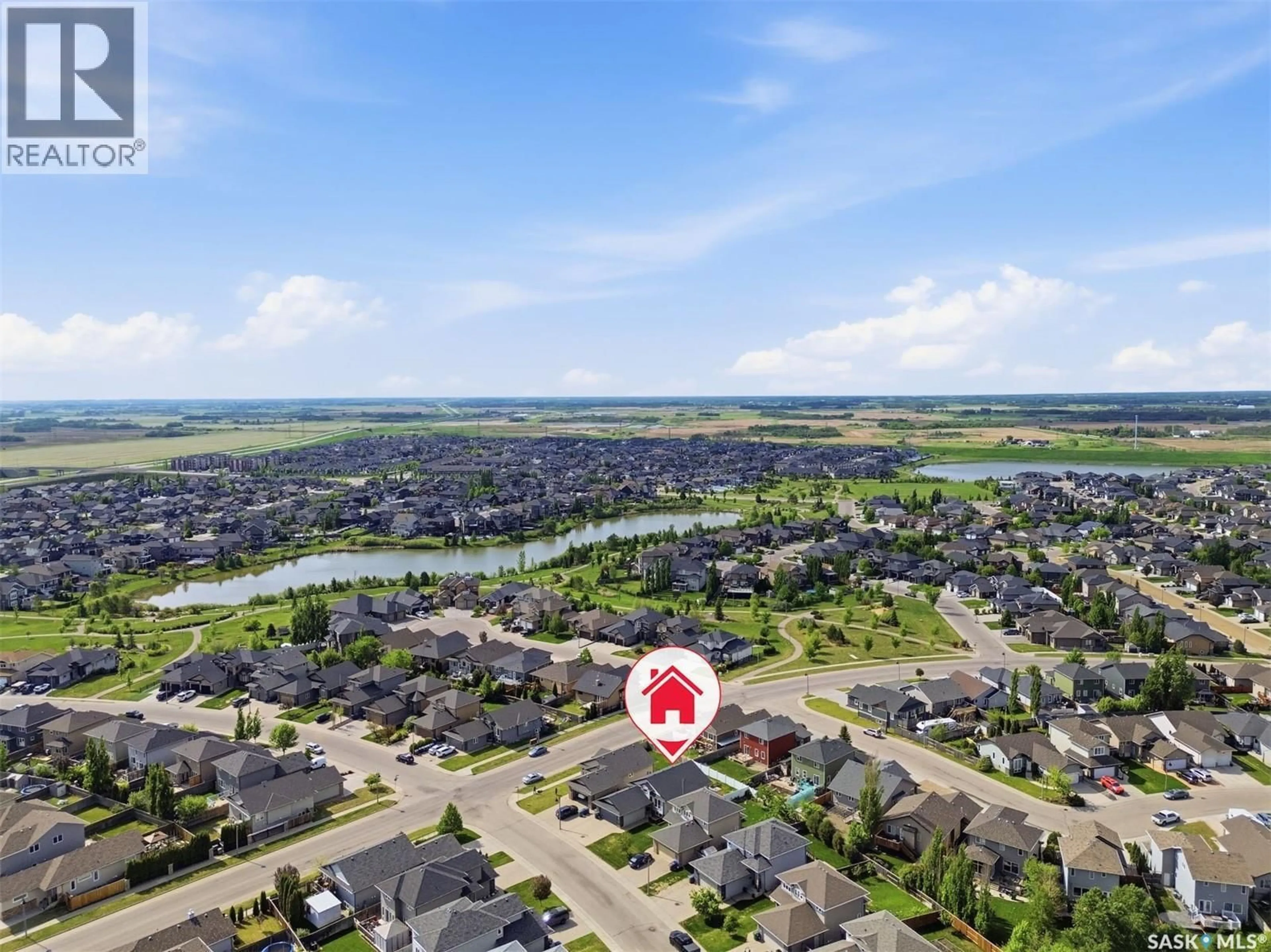 A pic from outside/outdoor area/front of a property/back of a property/a pic from drone, water/lake/river/ocean view for 174 WHALLEY CRESCENT, Saskatoon Saskatchewan S7T0H8