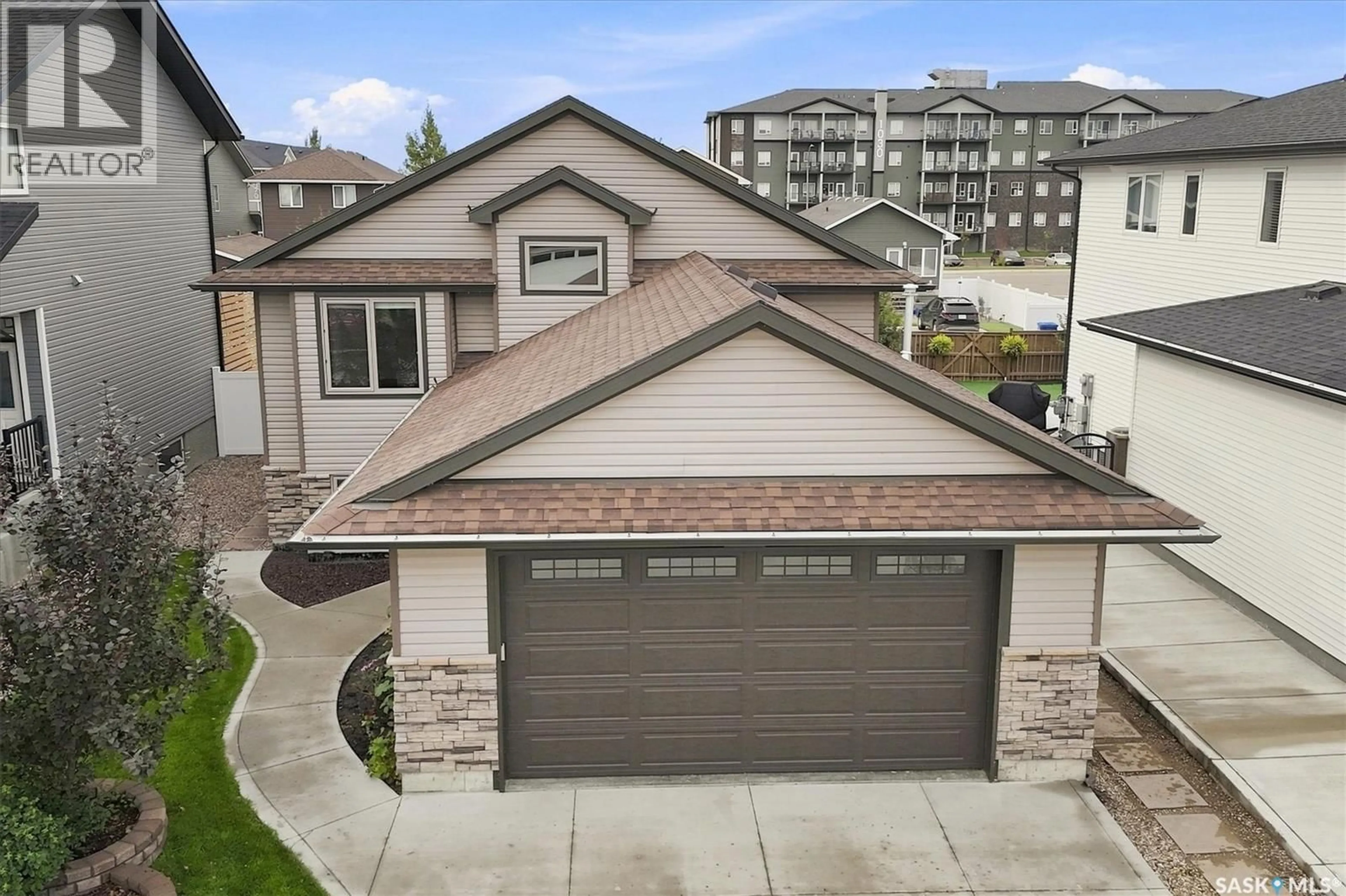 A pic from outside/outdoor area/front of a property/back of a property/a pic from drone, street for 204 COWAN CRESCENT, Martensville Saskatchewan S0K2A0