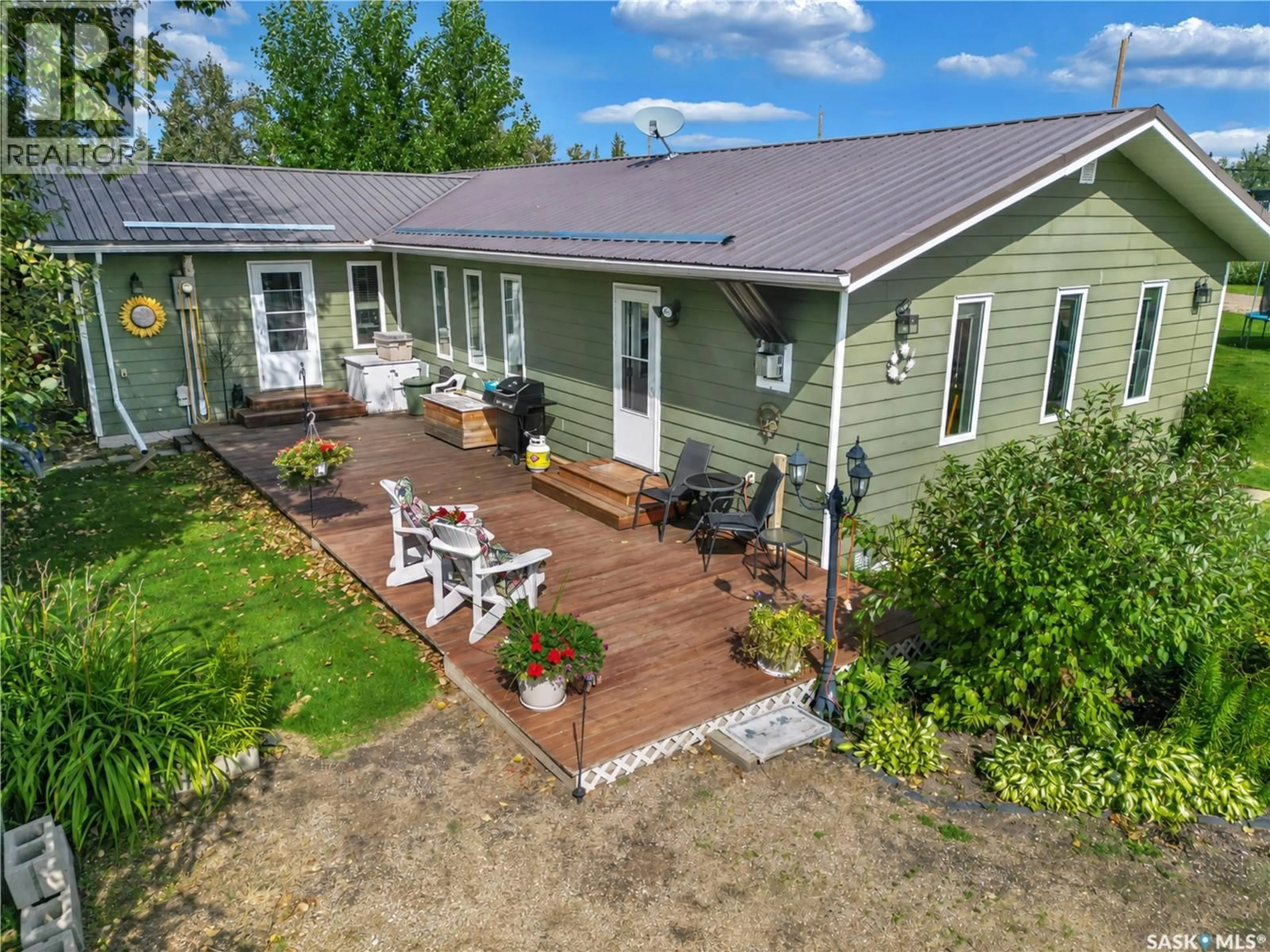 A pic from outside/outdoor area/front of a property/back of a property/a pic from drone, unknown for 303 CORRIGAL CRESCENT, Turtle View Saskatchewan S0M1J0