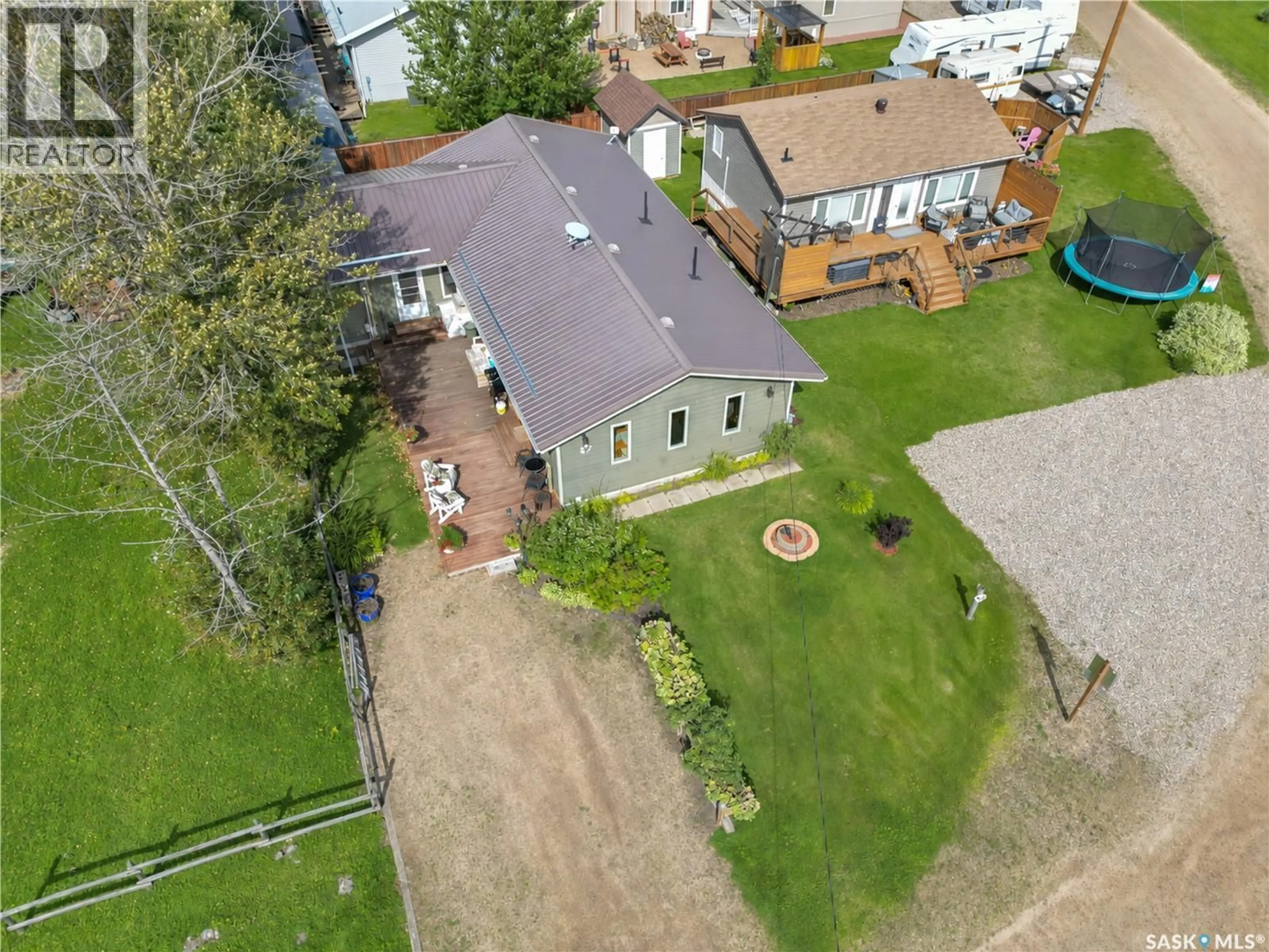 A pic from outside/outdoor area/front of a property/back of a property/a pic from drone, street for 303 CORRIGAL CRESCENT, Turtle View Saskatchewan S0M1J0