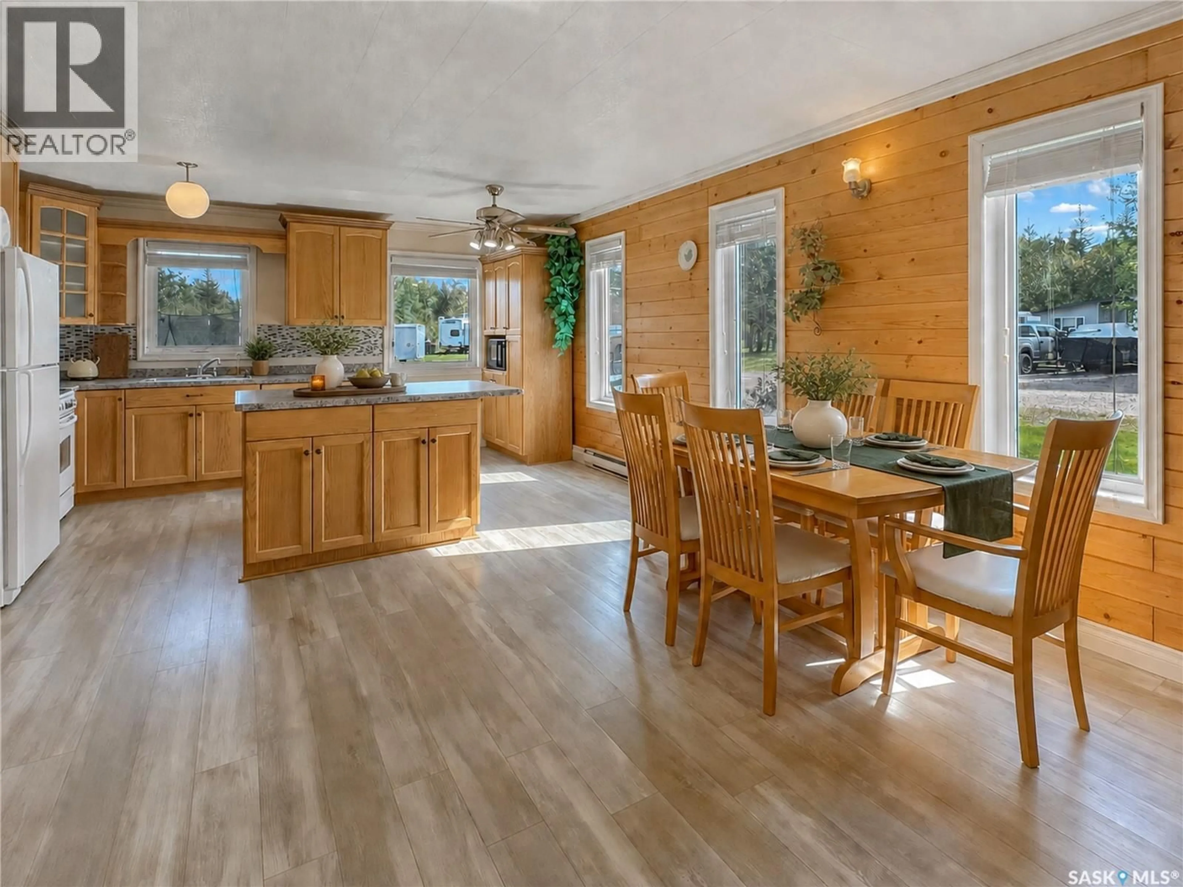 Open concept kitchen, wood/laminate floor for 303 CORRIGAL CRESCENT, Turtle View Saskatchewan S0M1J0