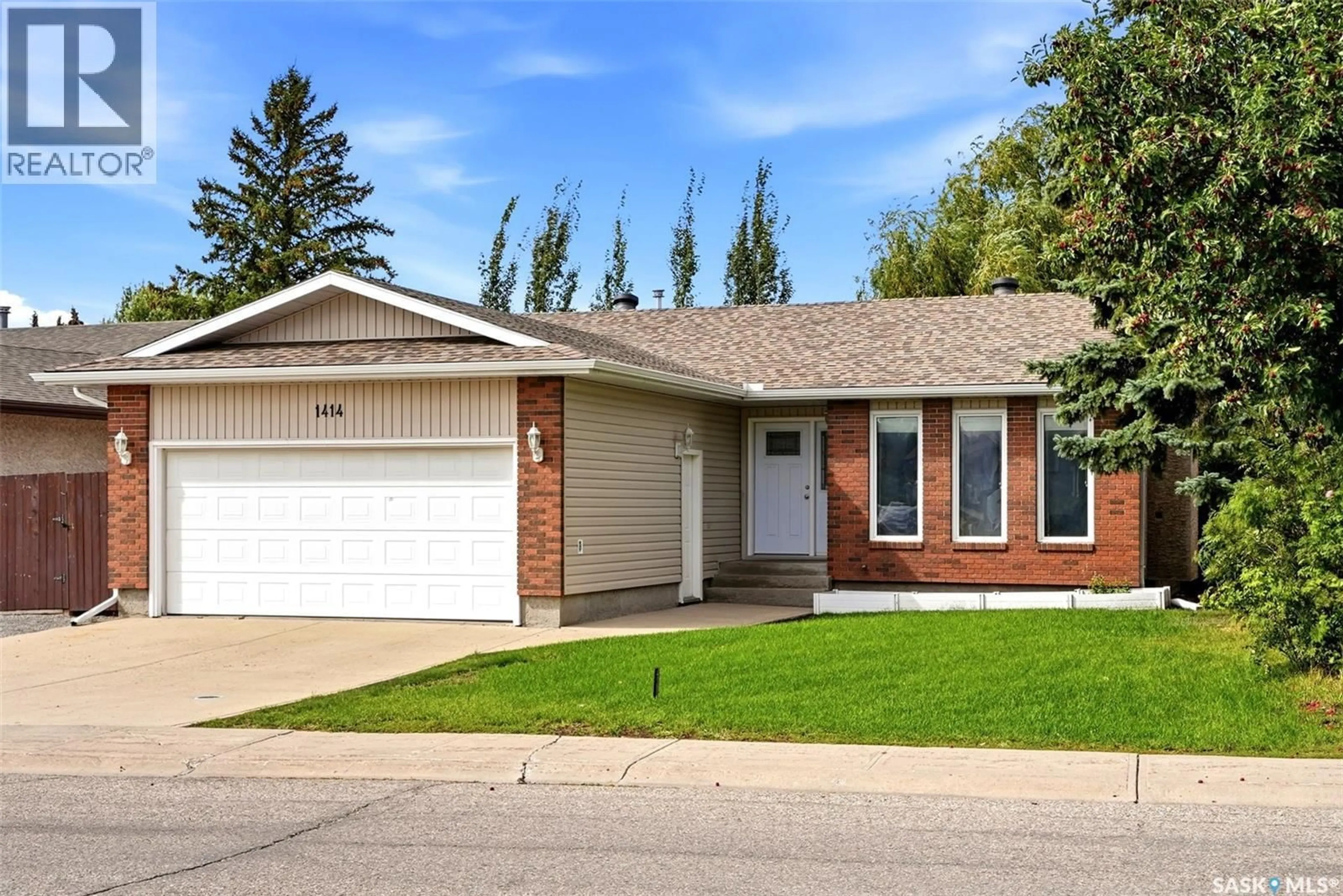 Home with vinyl exterior material, street for 1414 RADWAY STREET, Regina Saskatchewan S4X4A7