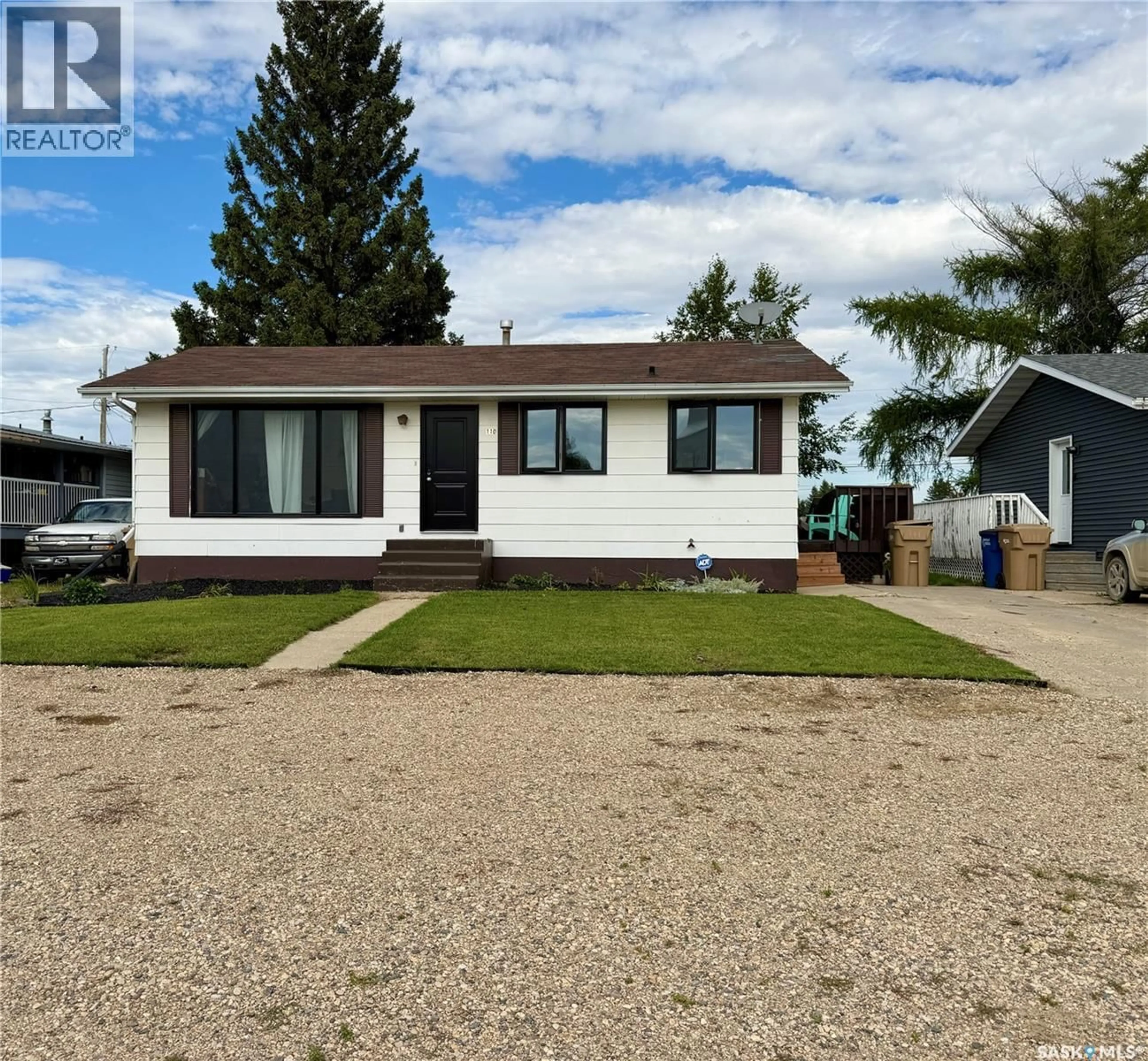 Home with vinyl exterior material, street for 110 RAILWAY AVENUE, Shellbrook Saskatchewan S0J2E0