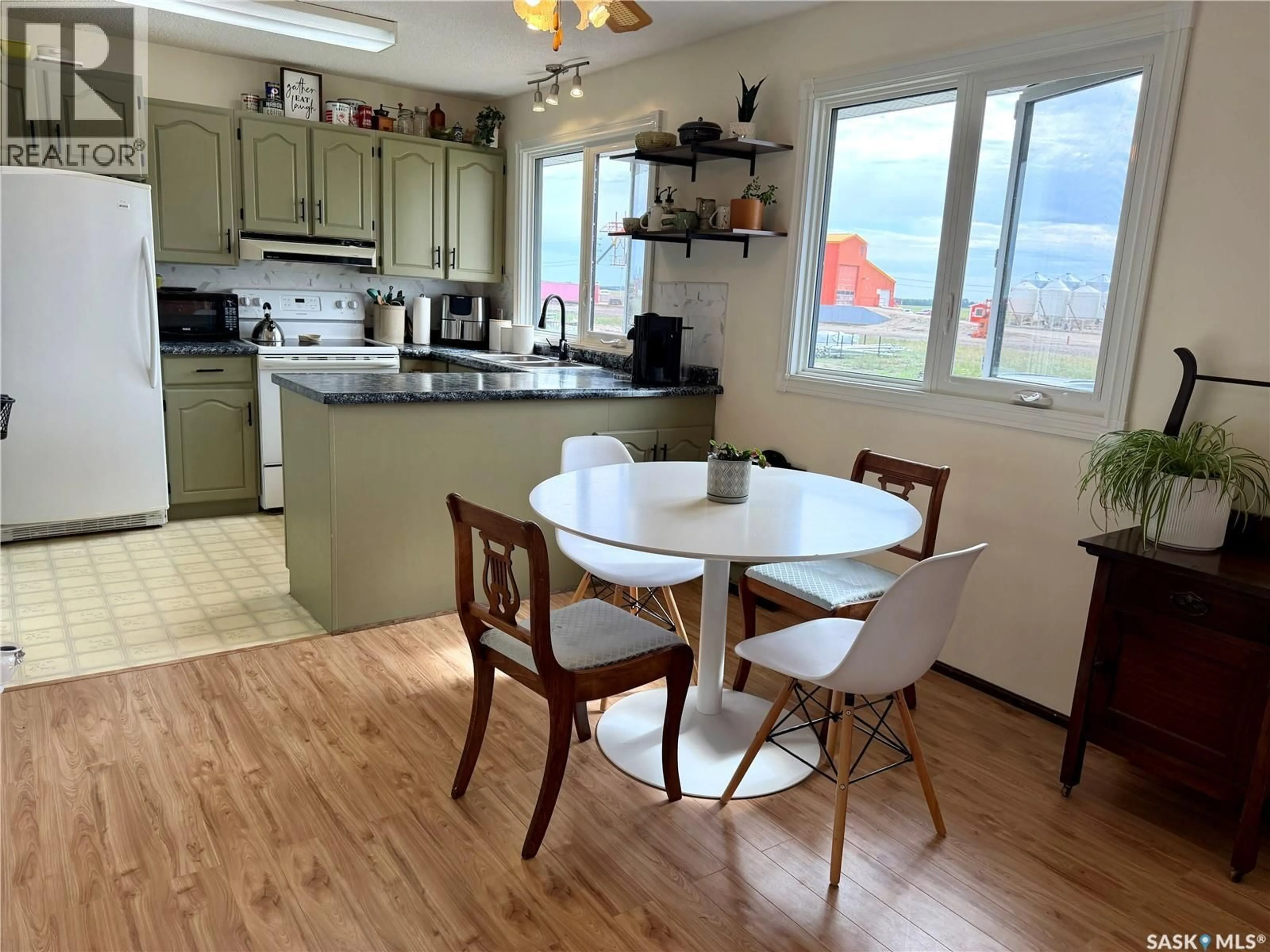 Open concept kitchen, wood/laminate floor for 110 RAILWAY AVENUE, Shellbrook Saskatchewan S0J2E0