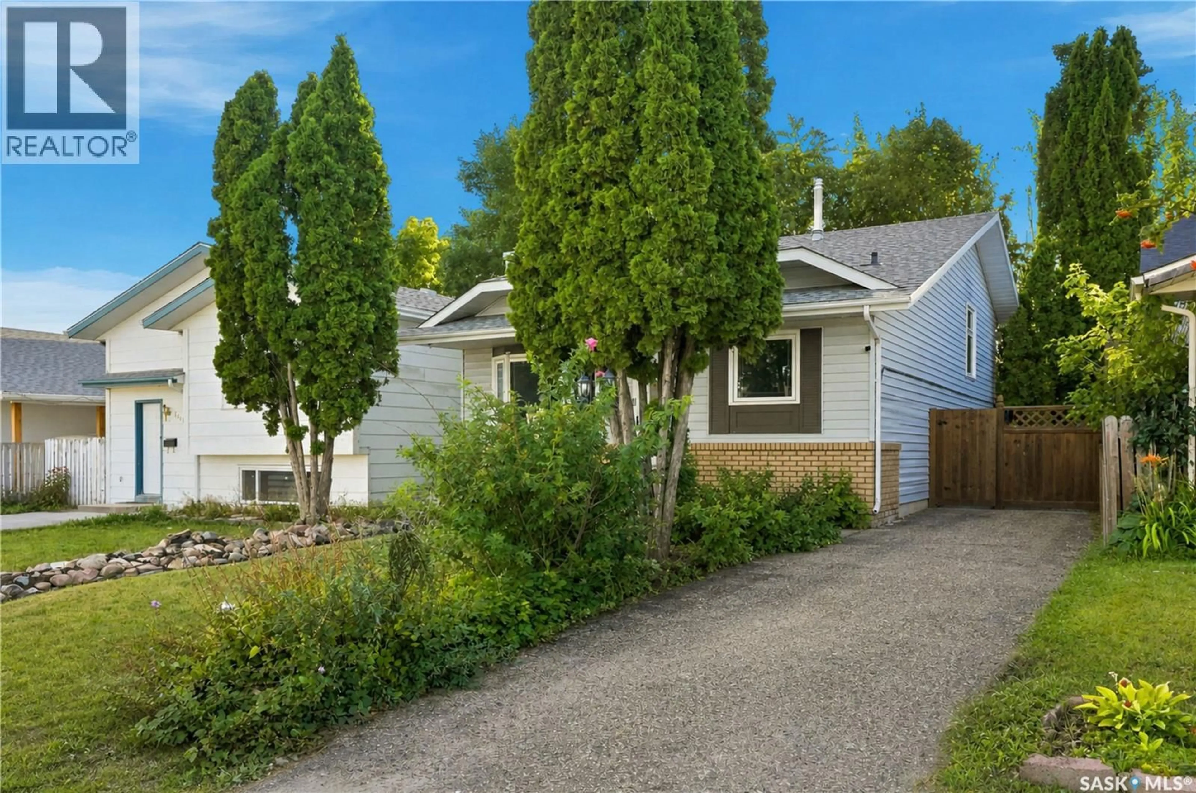 A pic from outside/outdoor area/front of a property/back of a property/a pic from drone, street for 1423 JUNOR AVENUE, Saskatoon Saskatchewan S7L6T7