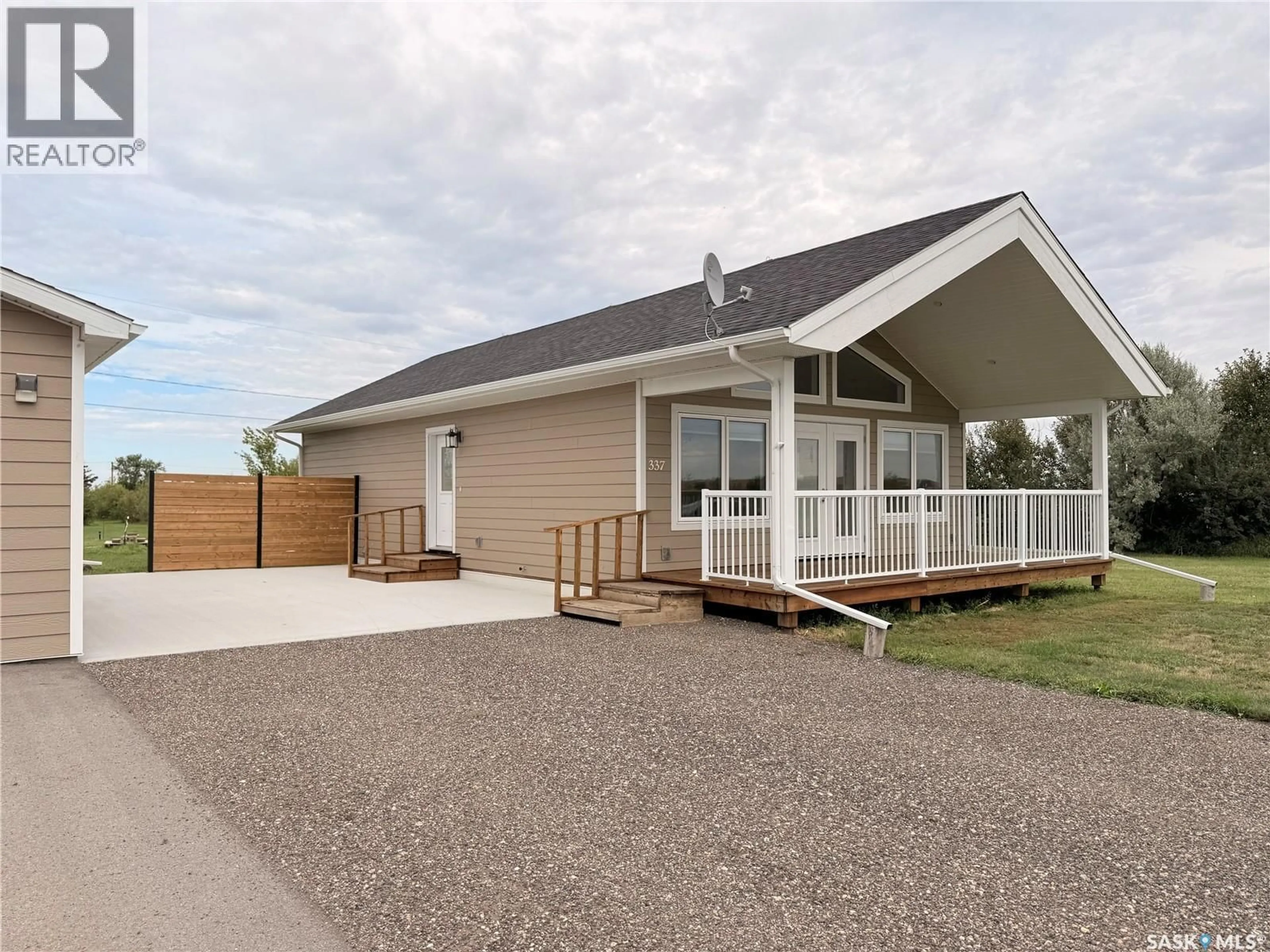 Home with vinyl exterior material, street for 337 RAILWAY AVENUE, Broderick Saskatchewan S0H0L0