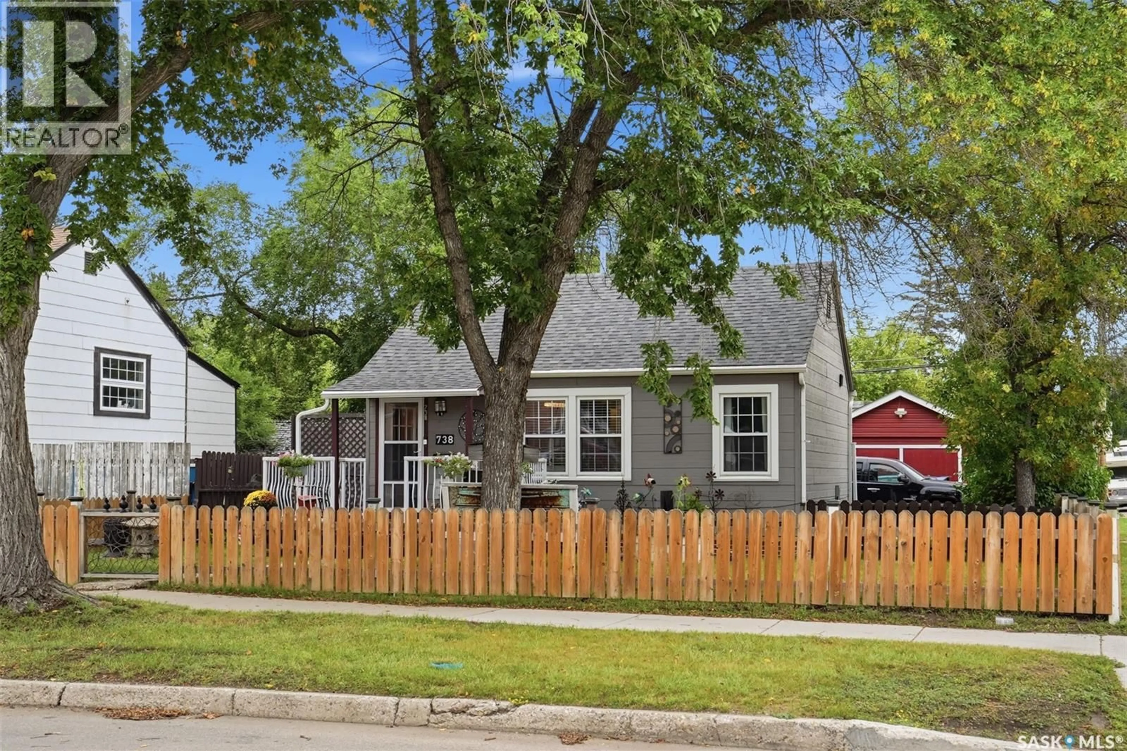 Home with vinyl exterior material, street for 738 K AVENUE, Saskatoon Saskatchewan S7M2E6