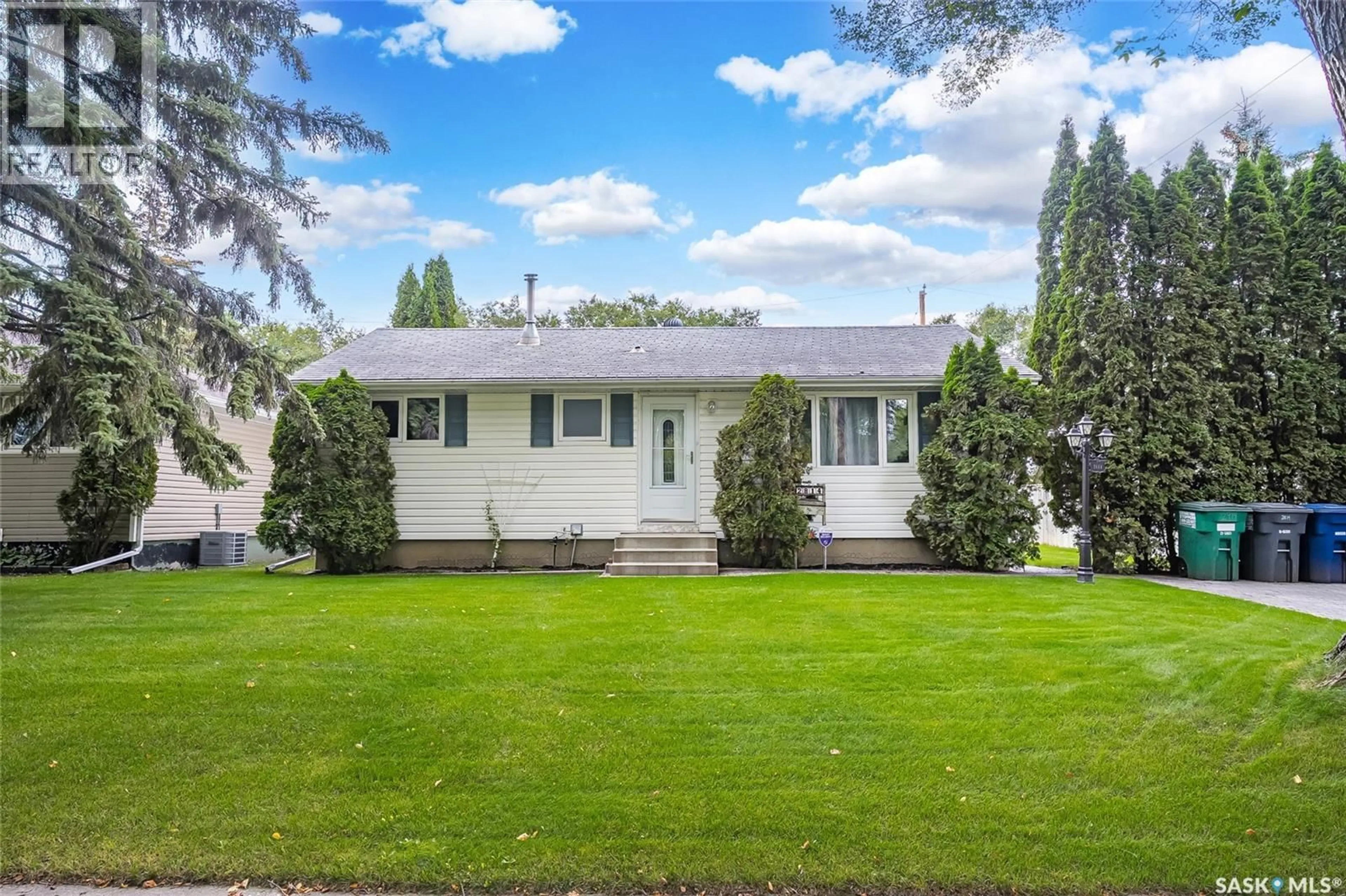 Home with vinyl exterior material, street for 2814 21ST STREET, Saskatoon Saskatchewan S7M0W5
