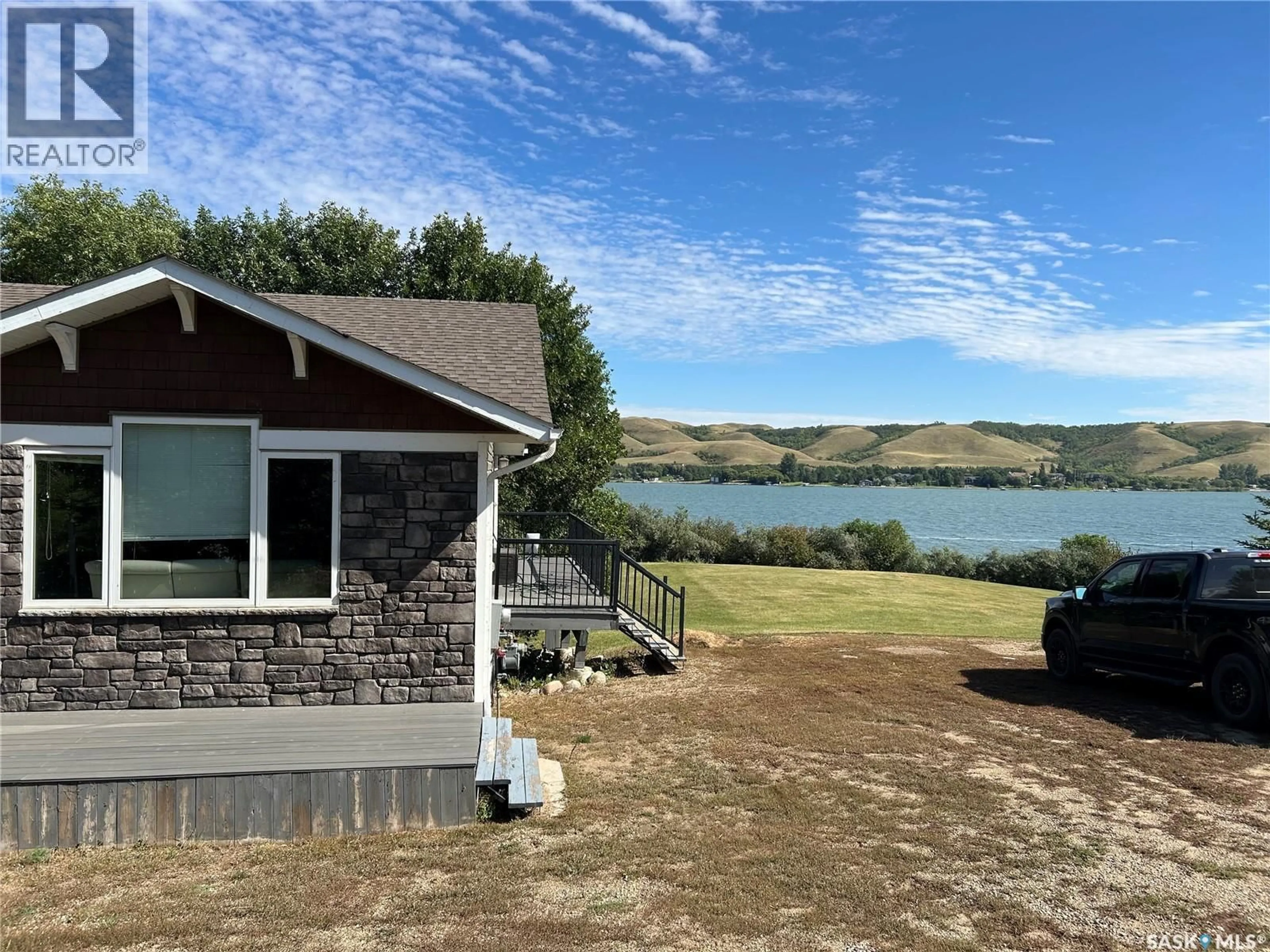 A pic from outside/outdoor area/front of a property/back of a property/a pic from drone, water/lake/river/ocean view for 1260 TATANKA DRIVE, Buffalo Pound Lake Saskatchewan S6H5G1
