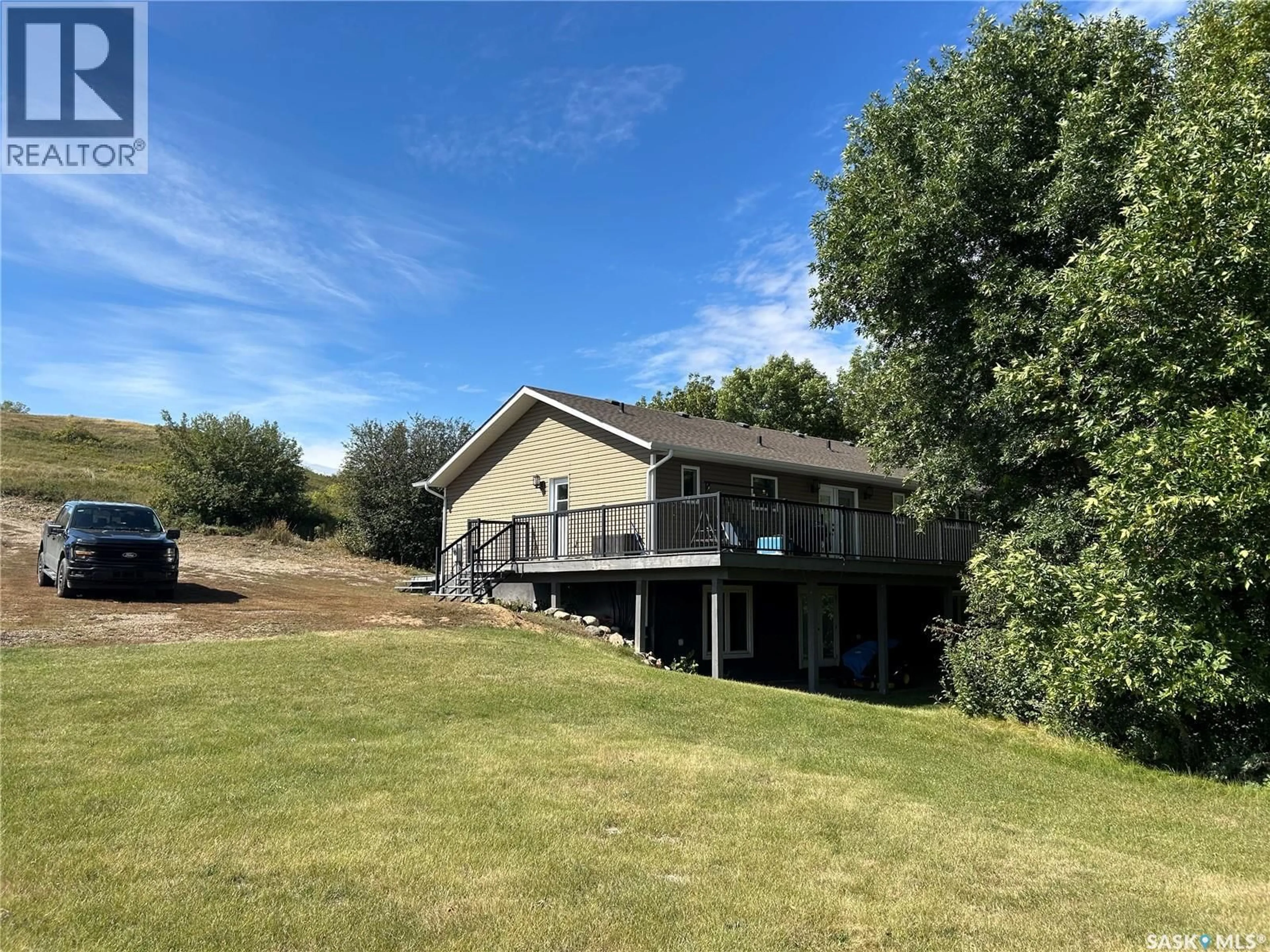 A pic from outside/outdoor area/front of a property/back of a property/a pic from drone, water/lake/river/ocean view for 1260 TATANKA DRIVE, Buffalo Pound Lake Saskatchewan S6H5G1