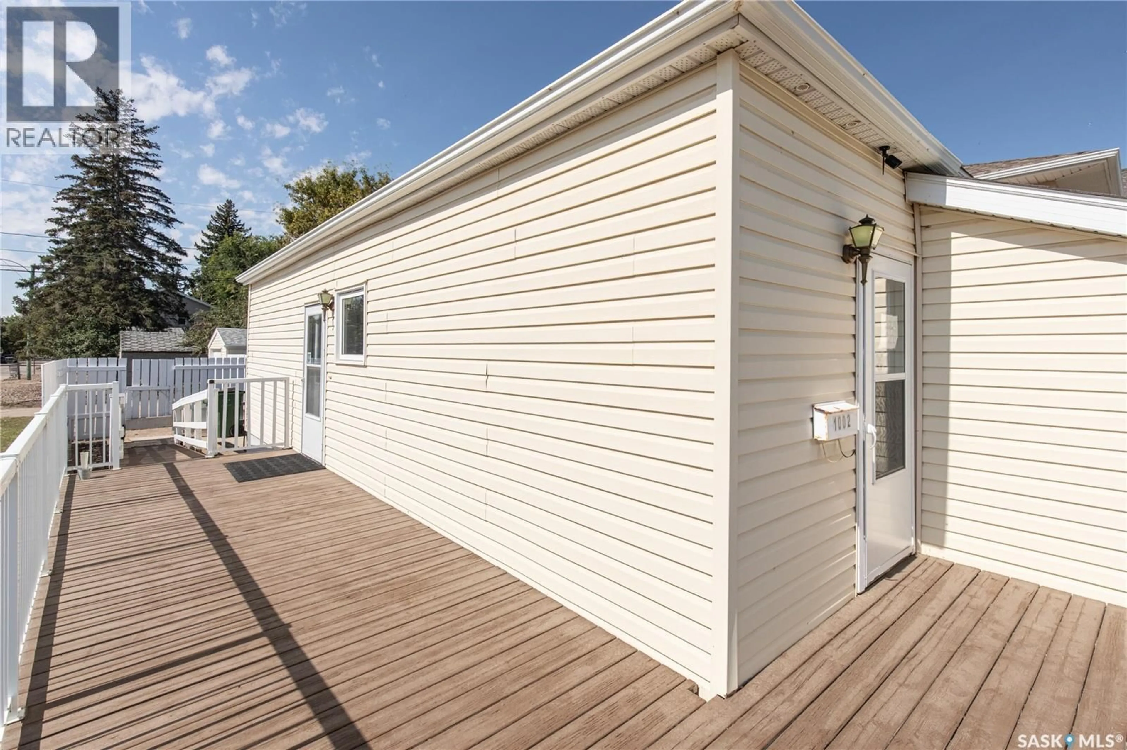 Home with vinyl exterior material, unknown for 1002 WOLFE AVENUE, Moose Jaw Saskatchewan S6H1J7