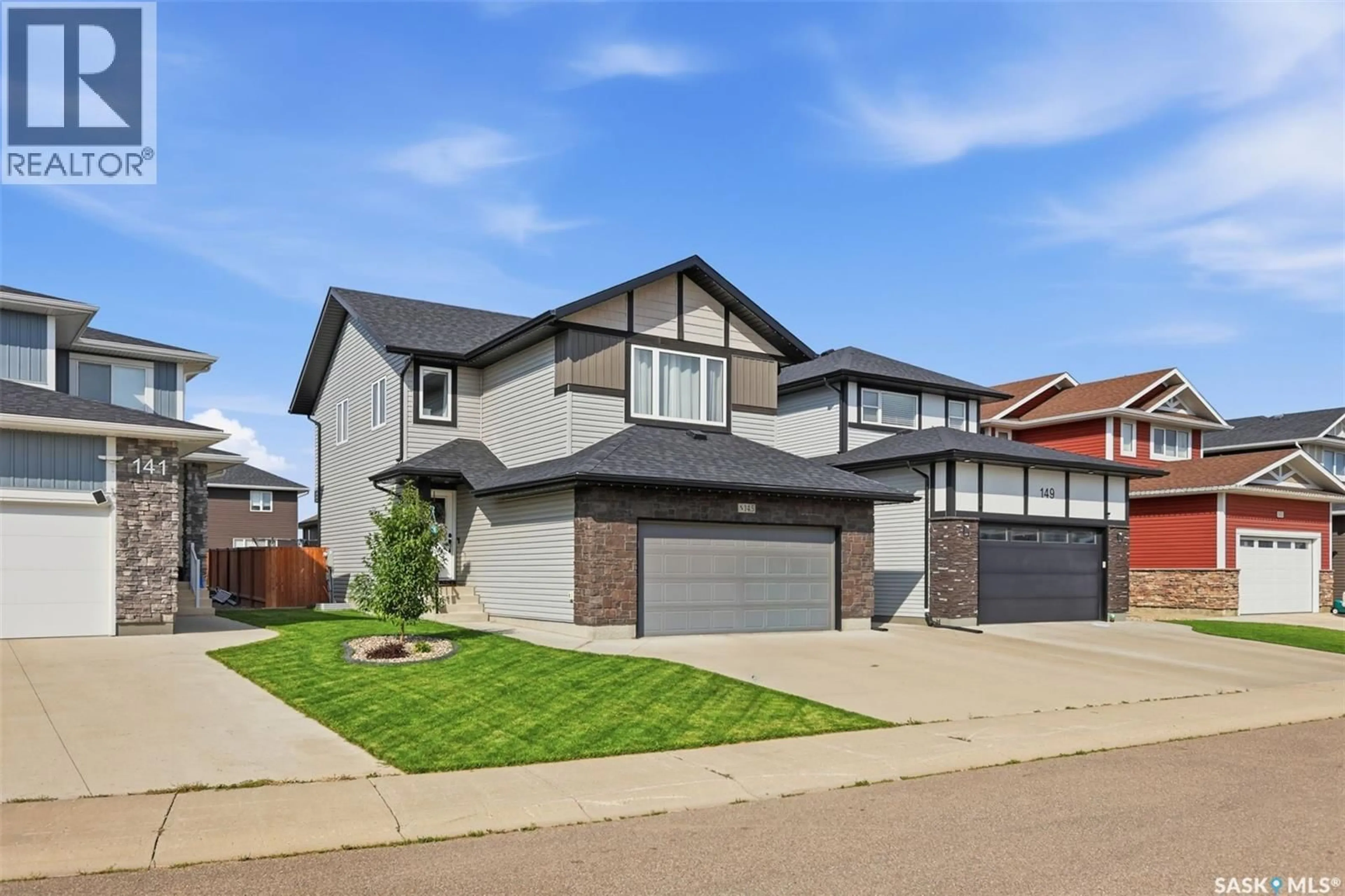 Home with brick exterior material, street for 145 COWAN CRESCENT, Martensville Saskatchewan S0K2T1