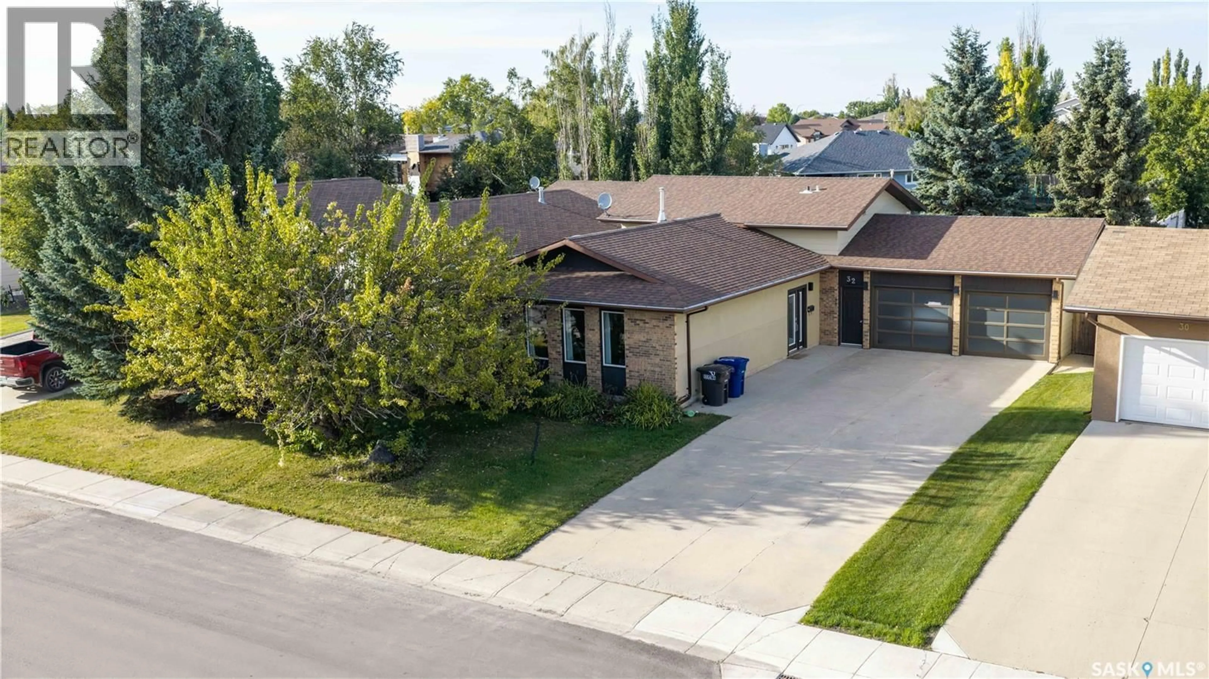 A pic from outside/outdoor area/front of a property/back of a property/a pic from drone, street for 32 BARNES CRESCENT, Humboldt Saskatchewan S0K2A0