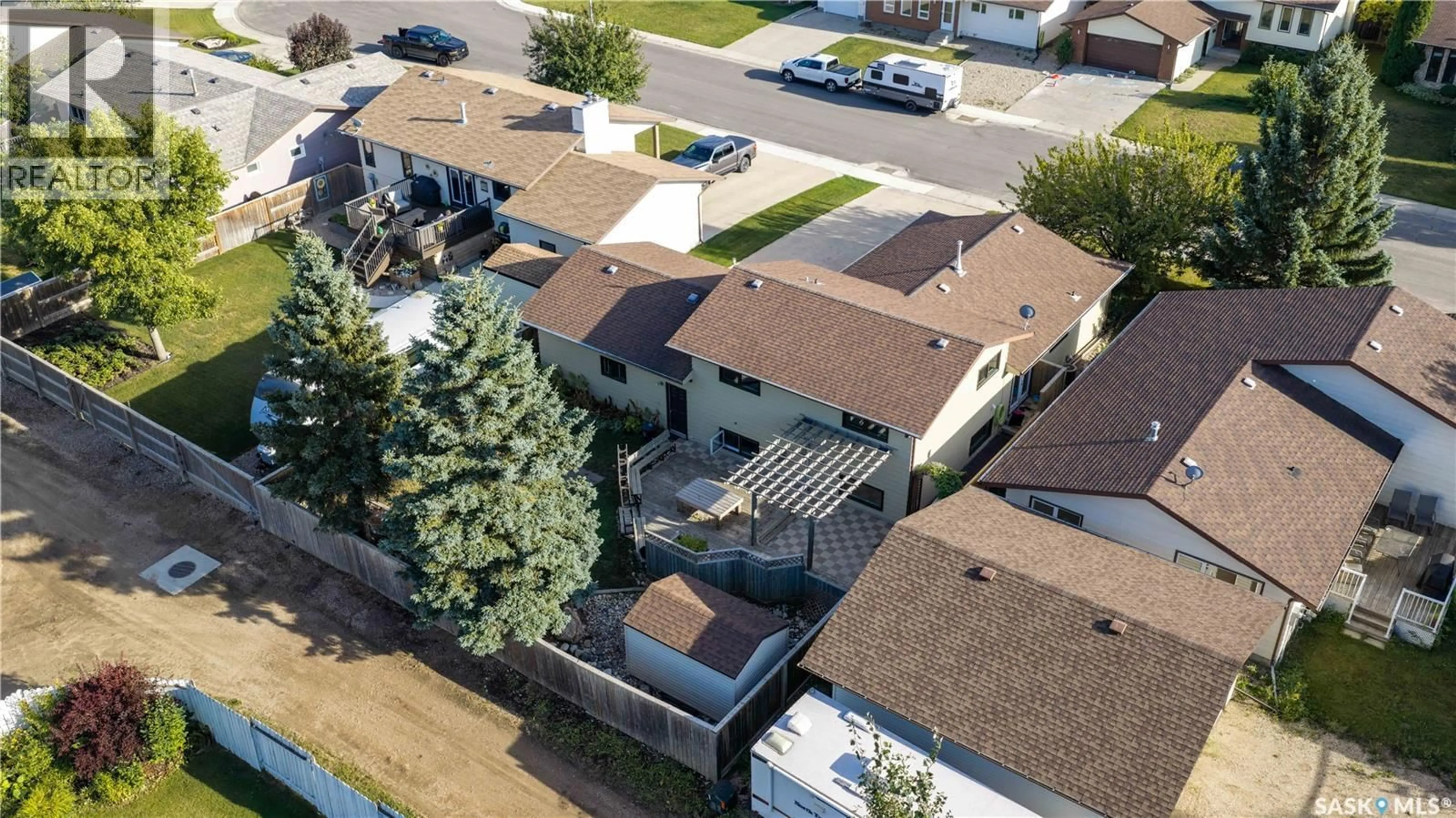 A pic from outside/outdoor area/front of a property/back of a property/a pic from drone, street for 32 BARNES CRESCENT, Humboldt Saskatchewan S0K2A0