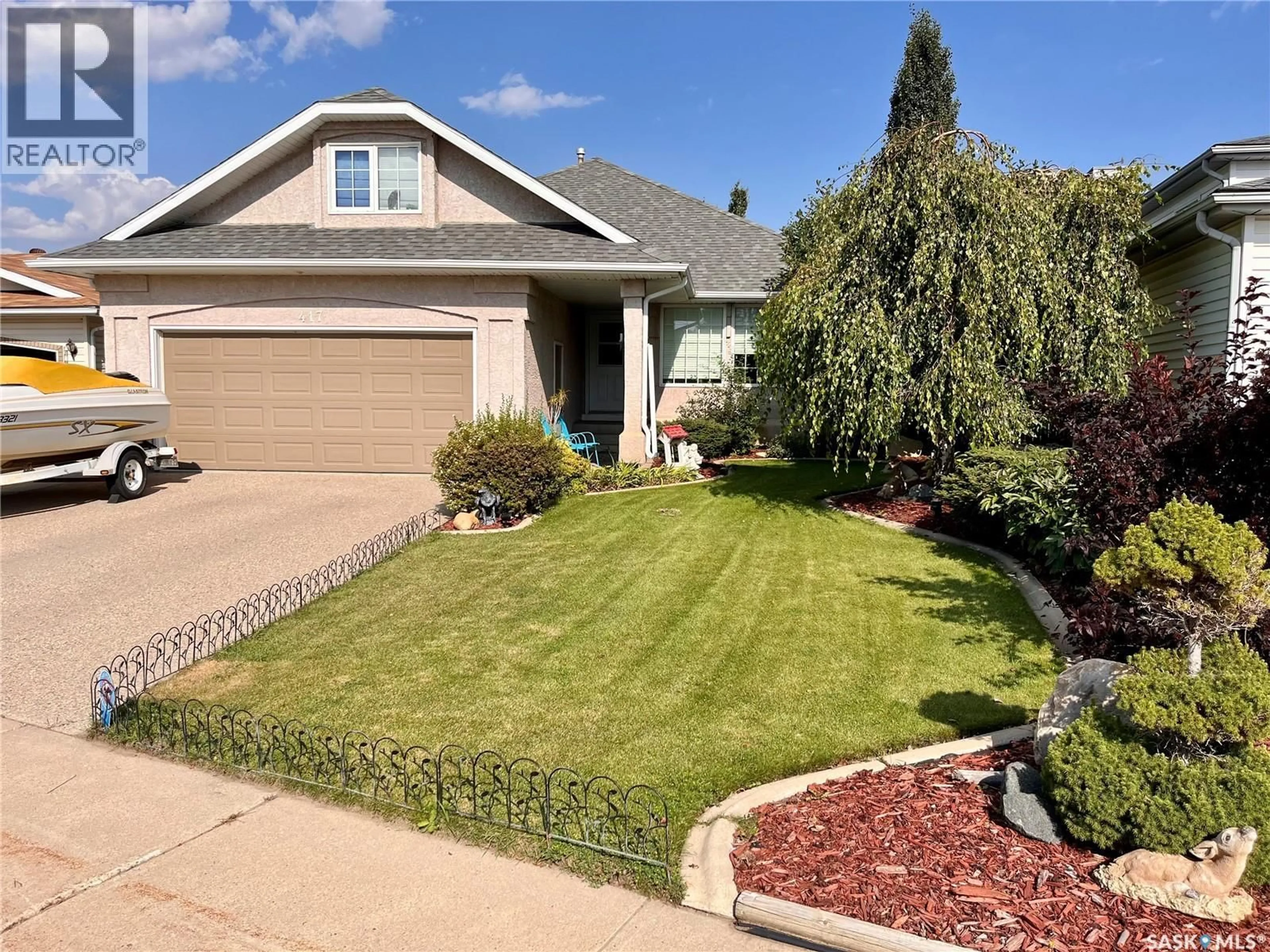 Home with vinyl exterior material, street for 417 4TH AVENUE, Martensville Saskatchewan S0K2T2