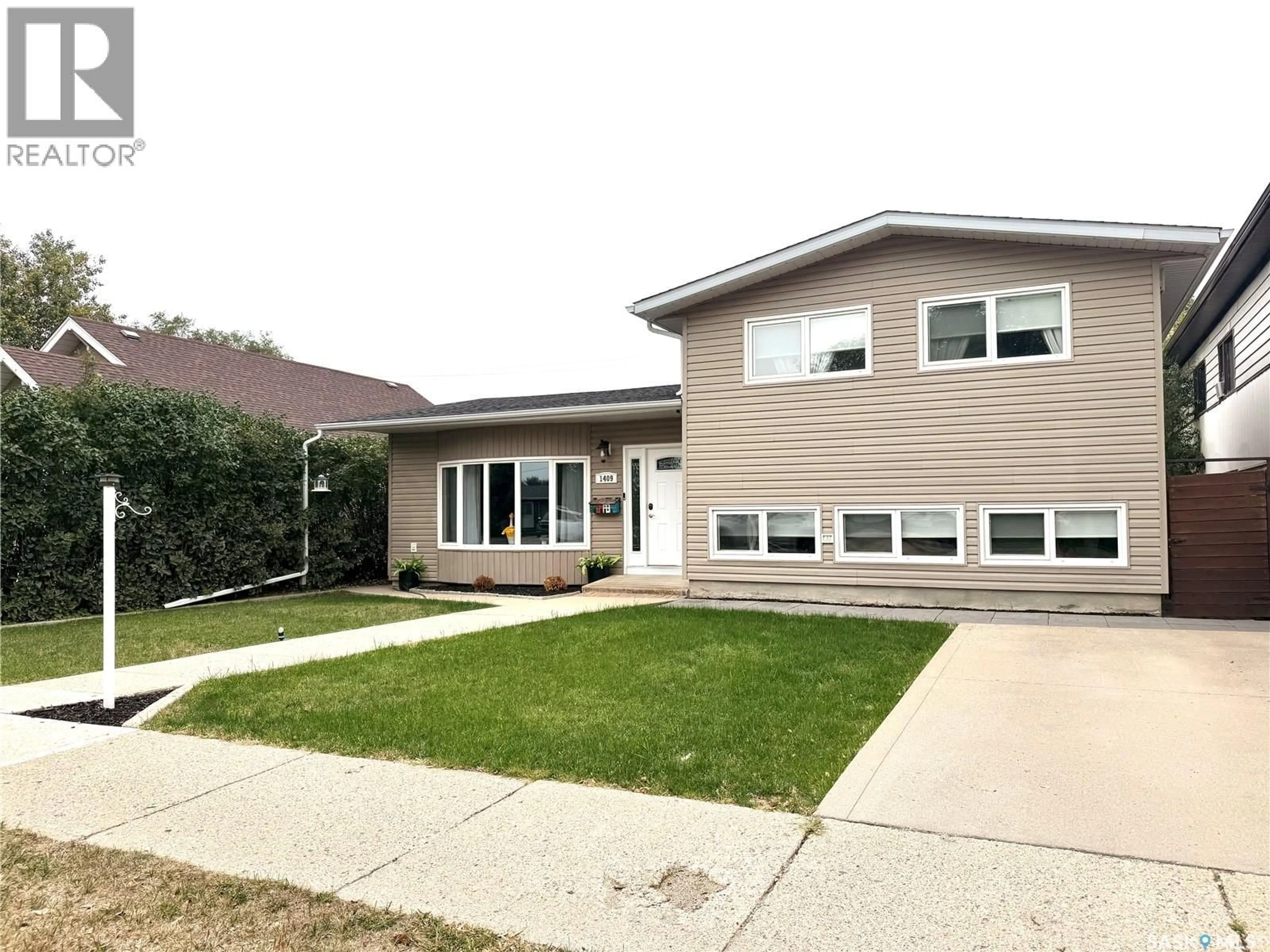 Home with vinyl exterior material, street for S - 1409 2ND STREET, Estevan Saskatchewan S4A0M5