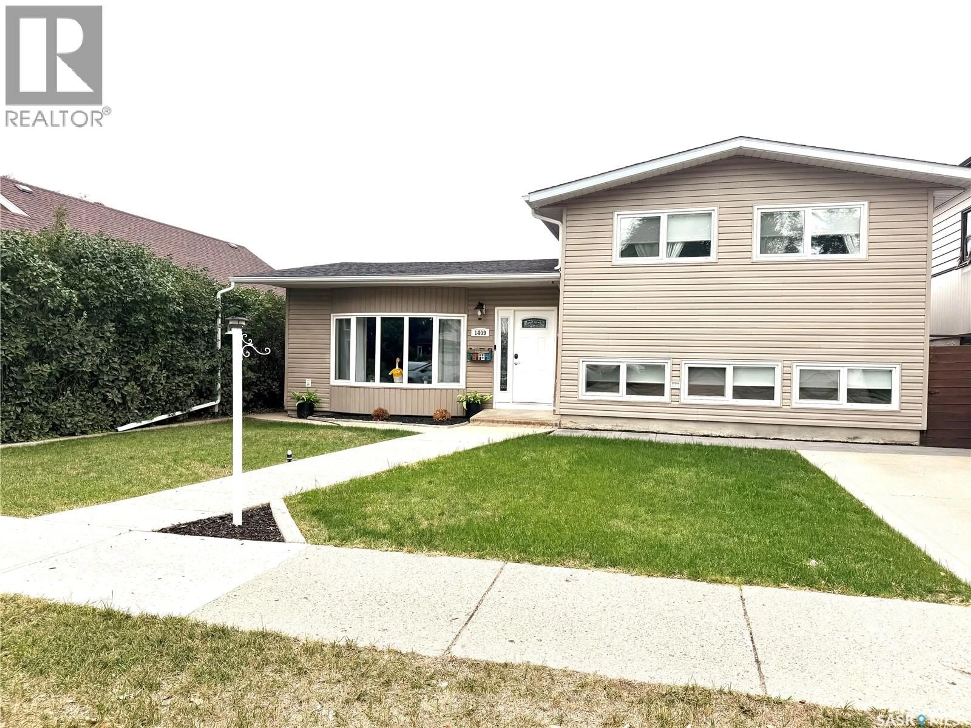 Home with vinyl exterior material, street for S - 1409 2ND STREET, Estevan Saskatchewan S4A0M5